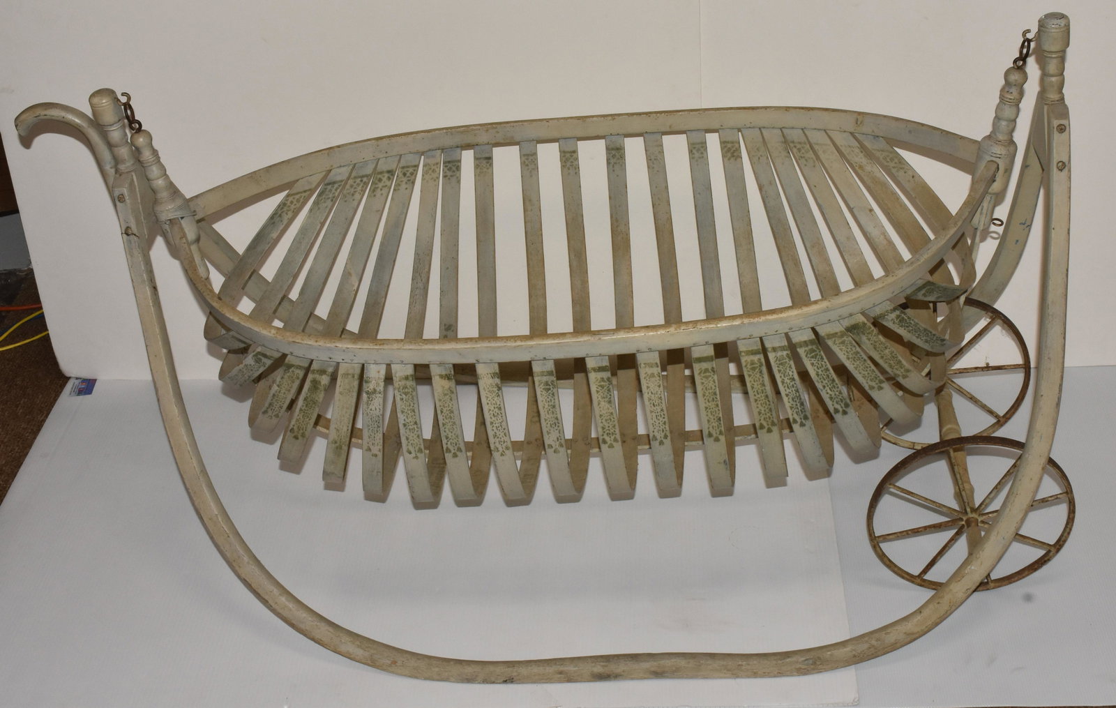 Rare 19th Century Pendulum Cradle: Made in Michigan County, Indiana and patented in October. 18 1876. Manufactured by Ford Johnson Co. Item has original paint and stenciling decorations. Wheels are operational .Minor split on one suppo