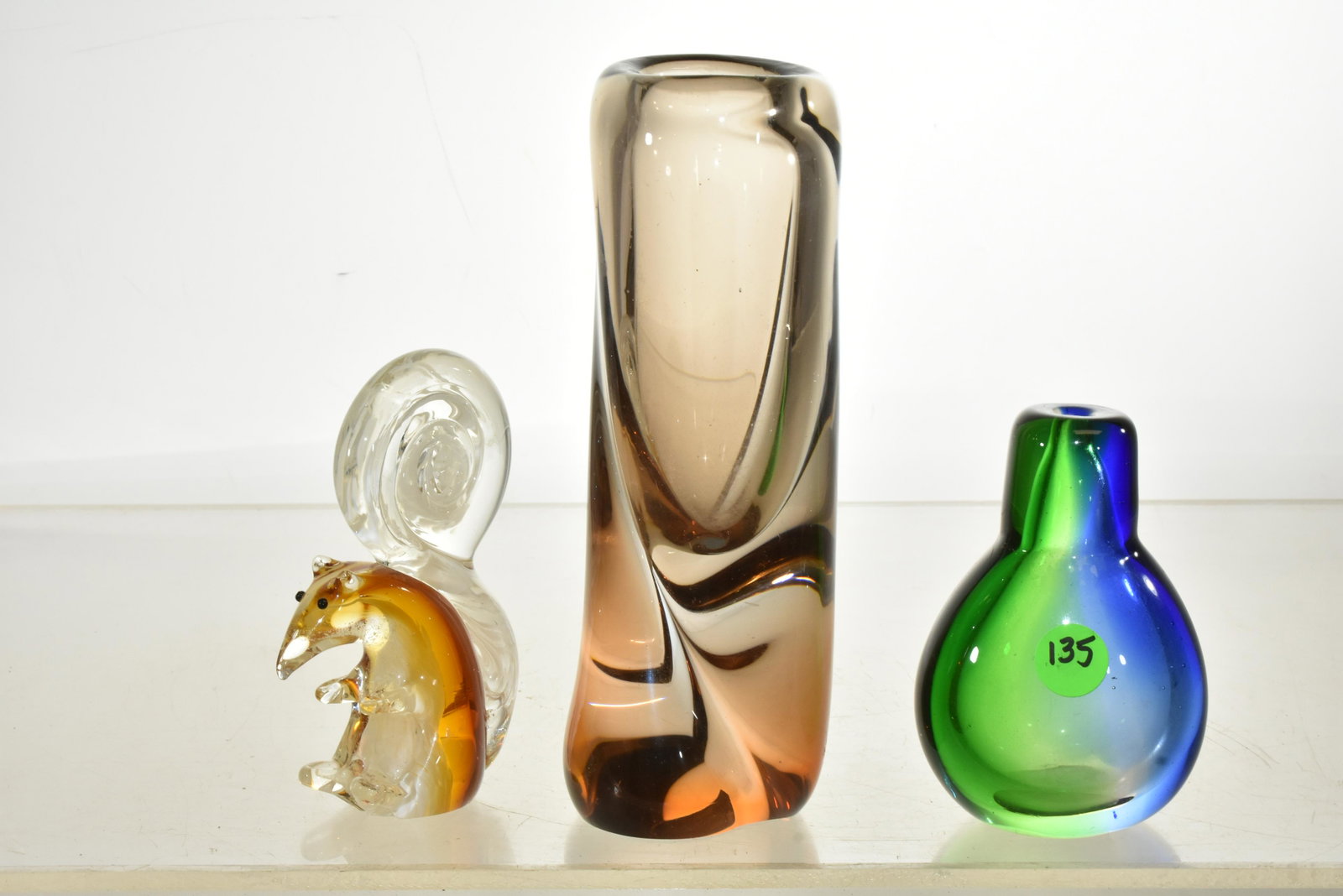 Collection of Murano Glass including Squirrel: Includes a Murano glass bud vase measuring APPROX. 8"h, a Murano glass squirrel measuring approx. 5"h and a small green and blue Murano vase with a small chip under base.