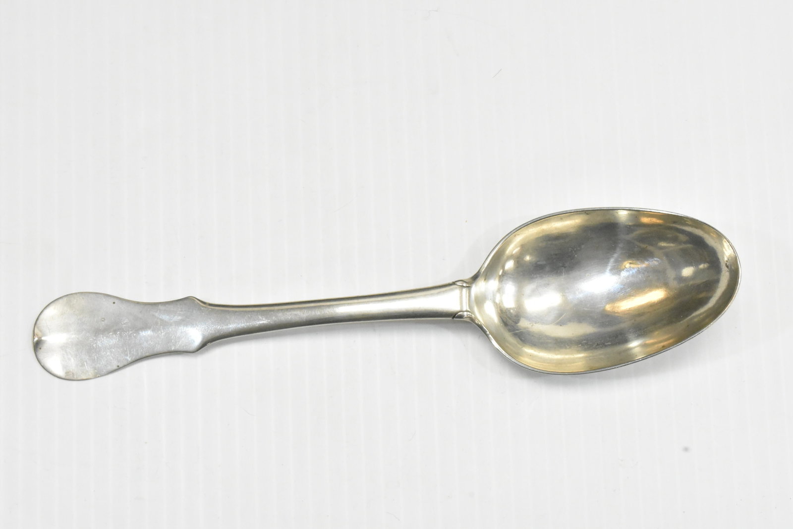 18th Century Danish Silver Spoon: Measures approx. 8 1/2" in length. Item has classic lines and a wreath 50and other engravings on reverse of bowl. It is hallmarked with a Viking type ship and the letters "AC". There is the name "Hans