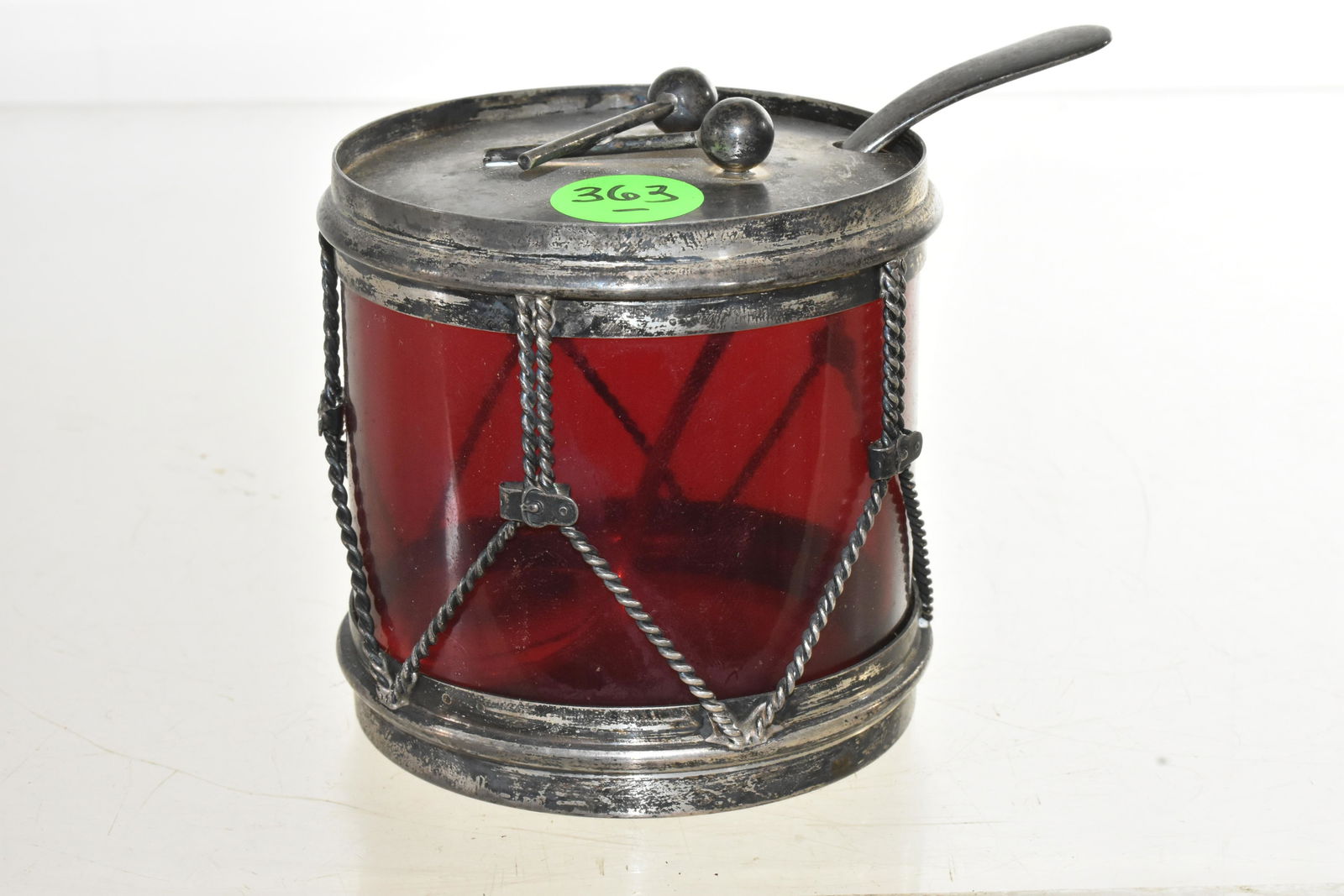 Victorian Sterling Drum Shaped Condiment Dish: Measures approx. 3"h x 3"dia. It is in the shape of a drum with a ruby glass insert. Item comes with a sterling ladle.