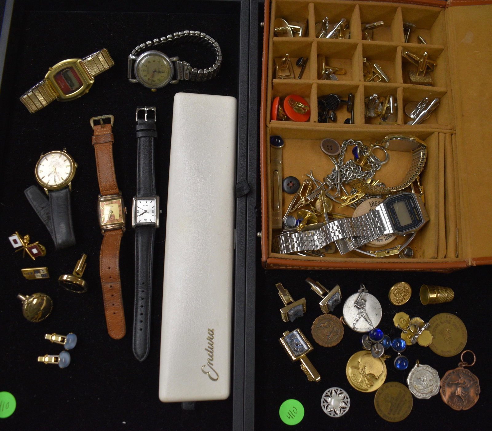 Watch and Cuff Link Grouping: include sports medals, cufflinks, and various watches such as bulova, Endura, etc. in leather box.