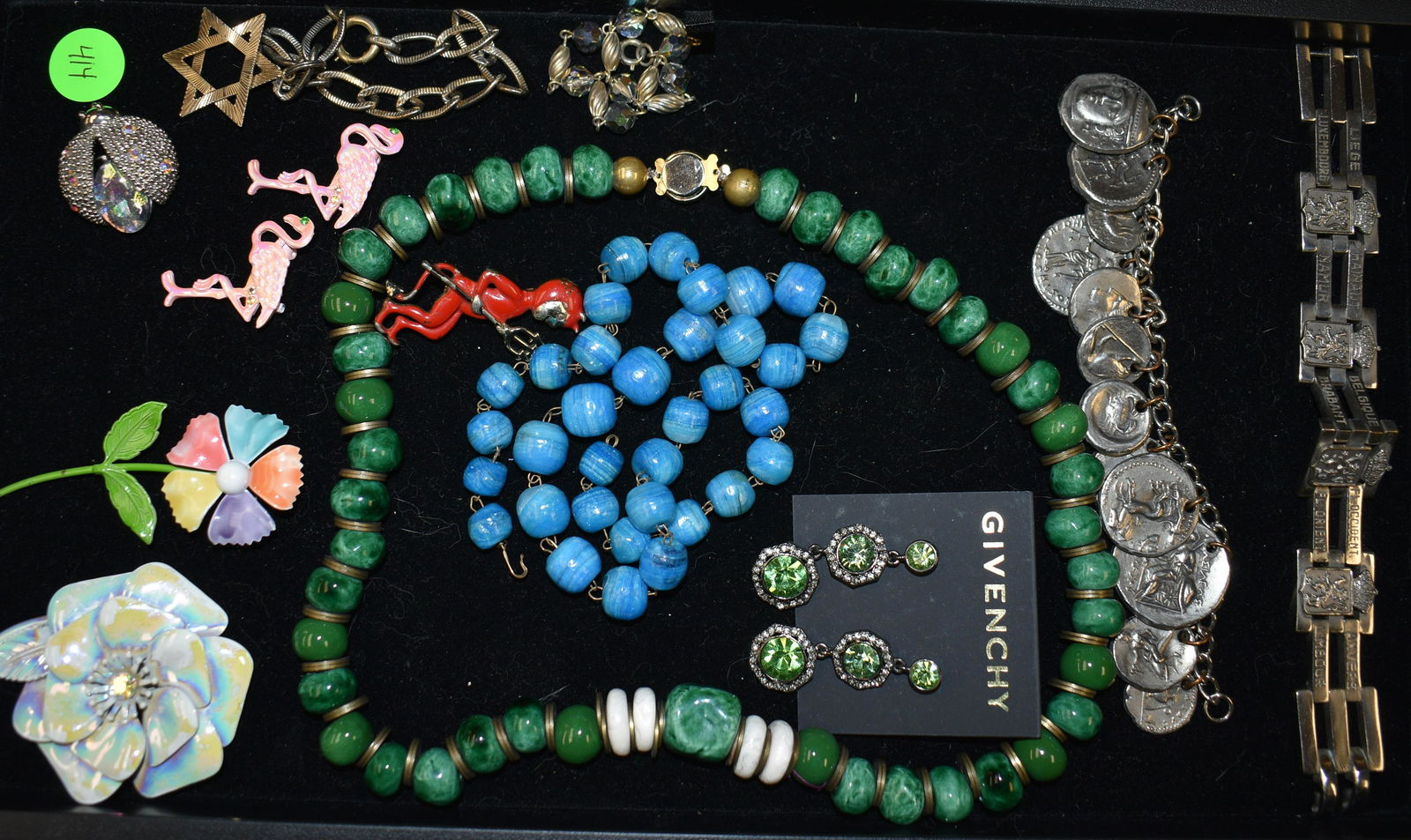 Vintage Jewelry Collection: includes a coin style bracelet, Givenchy earrings, floral brooches, necklaces, and more.
