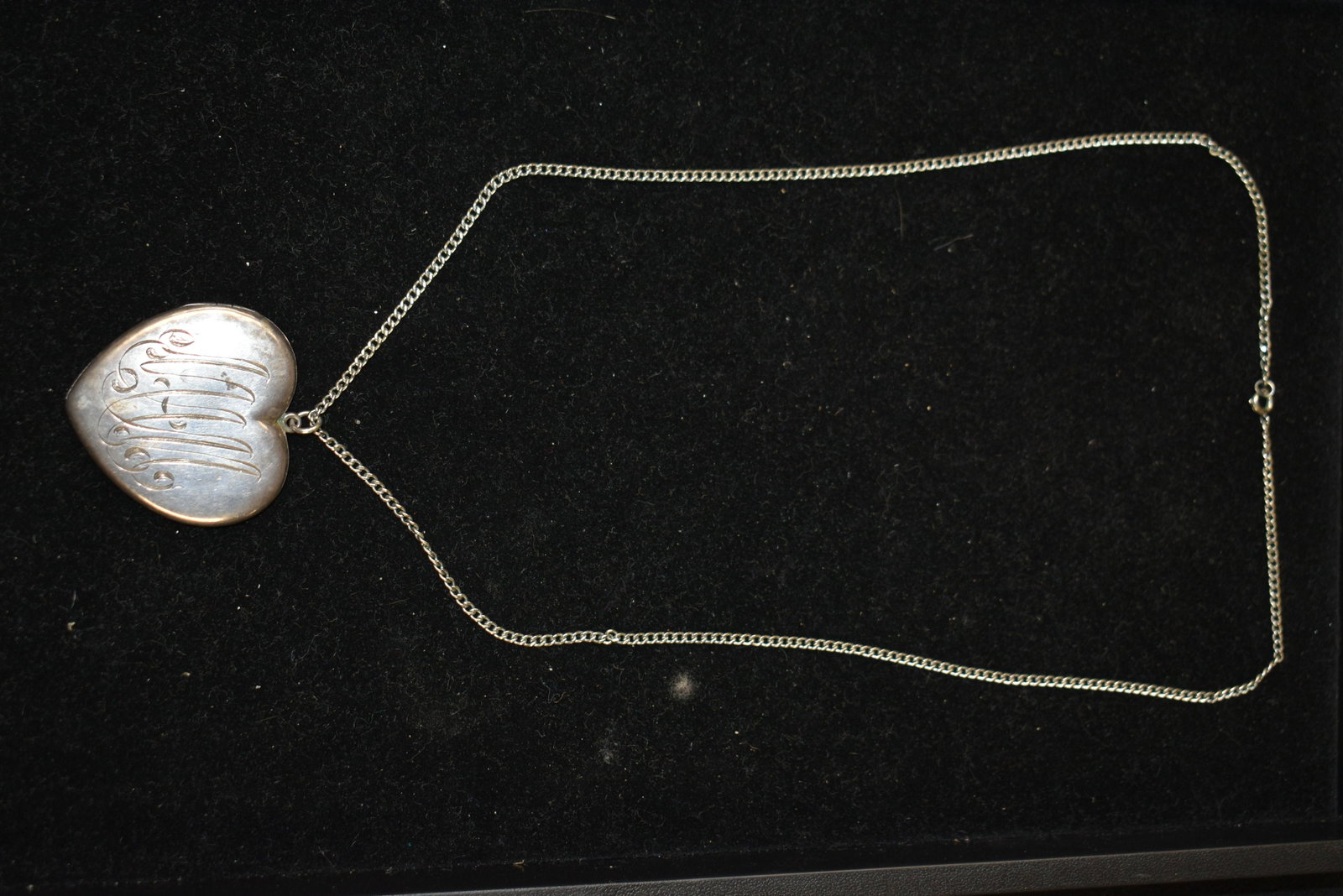Victorian Sterling Heart Locket: Locket is dated 1903 and Victorian monogram "MAM" and opens for photos. It stays closed when latched. Size approx 1 7/8" x 1 3/4"