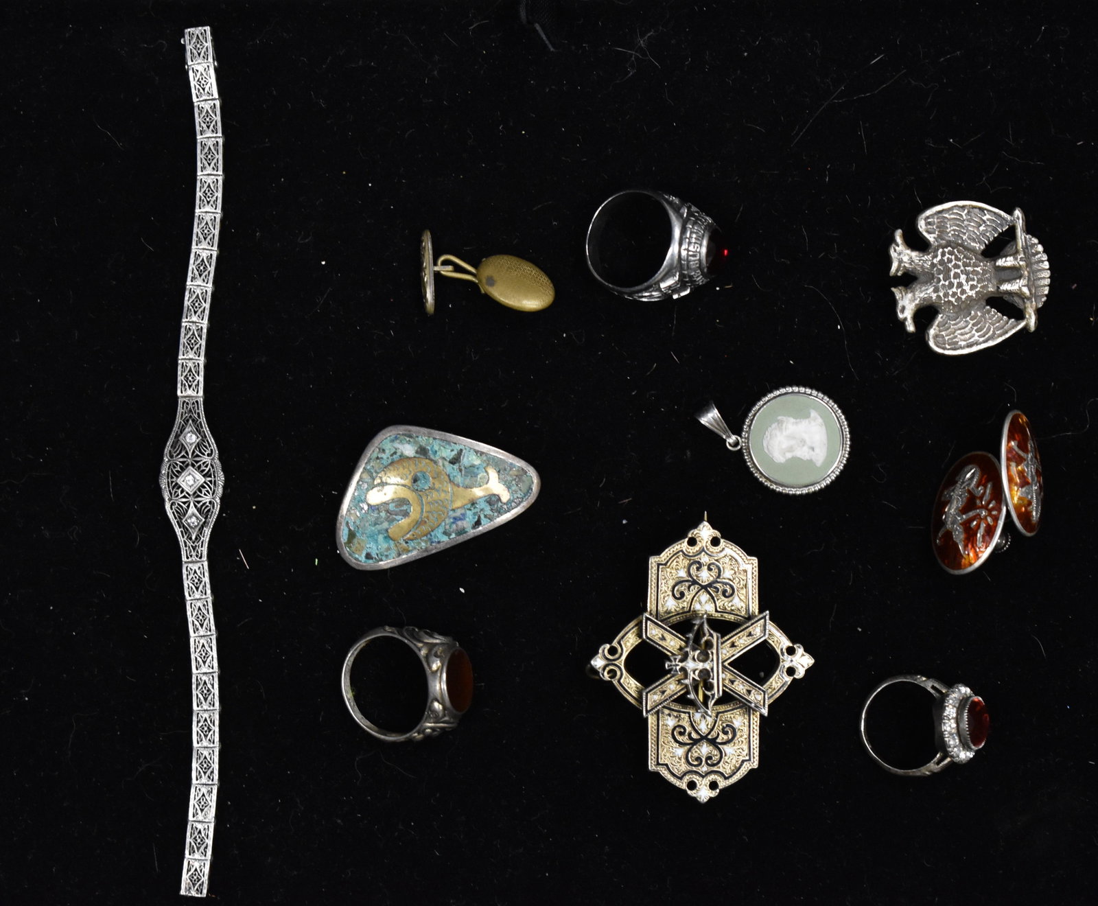 Vintage Sterling Jewelry Grouping: Including a sterling filigree bracelet, a lady's sterling ring with a carnelian stone, a Masonic medal with inlay, a pair of Siam earrings, a sterling school ring and other quality items.
