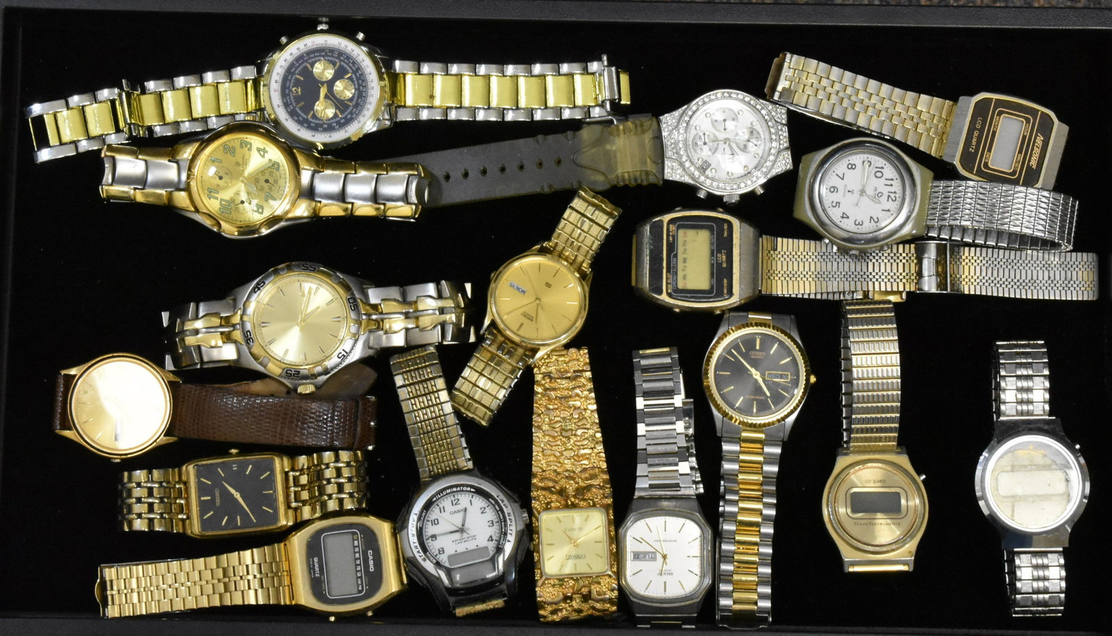 Grouping of Men's Wristwatches: Including a Seiko quartz with day and date, a Haband divers watch, a Louis Jordan divers watch, a gold tone Seiko, a Citizen quartz with day and date and many others.