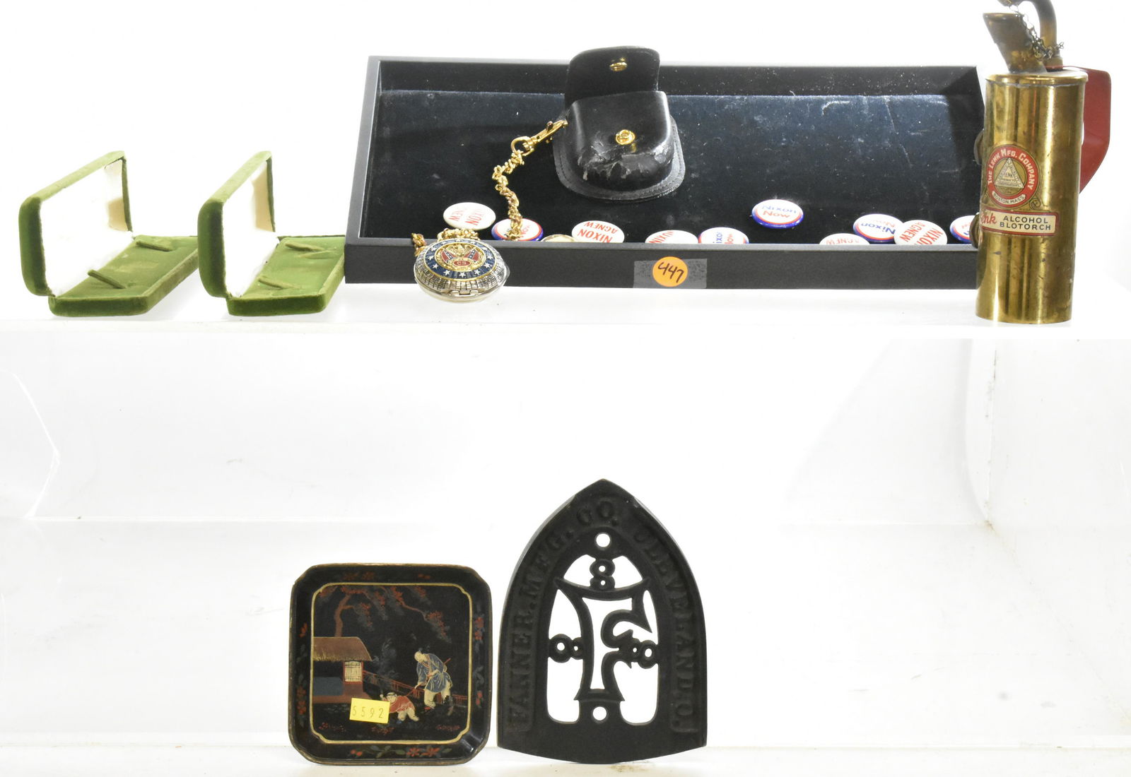 Eclectic Mixed Grouping: Includes eleven Nixon pins, two vintage watch cases, a Lenk brass torch, a CS pocket watch, a trivet and an Asian tray.