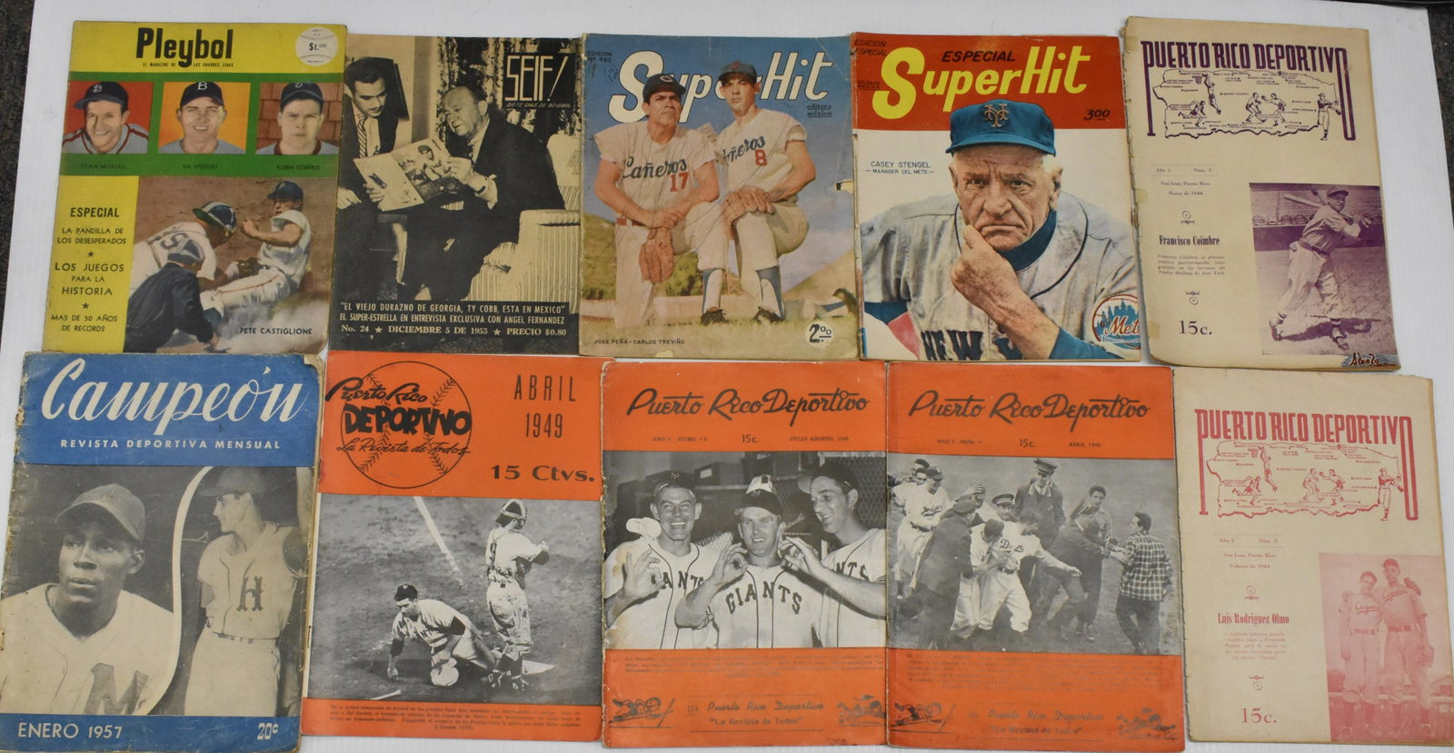 Grouping of Ten Latin American Magazines: Includes five Puerto Rico Deportivo February 1944 (#2) - April 1949, Seif! #24 1953, Pleybol #5 cover features Stan Musial, Gil Hodges, and Robin Roberts on front and Roberto Clemente on back, Campeon