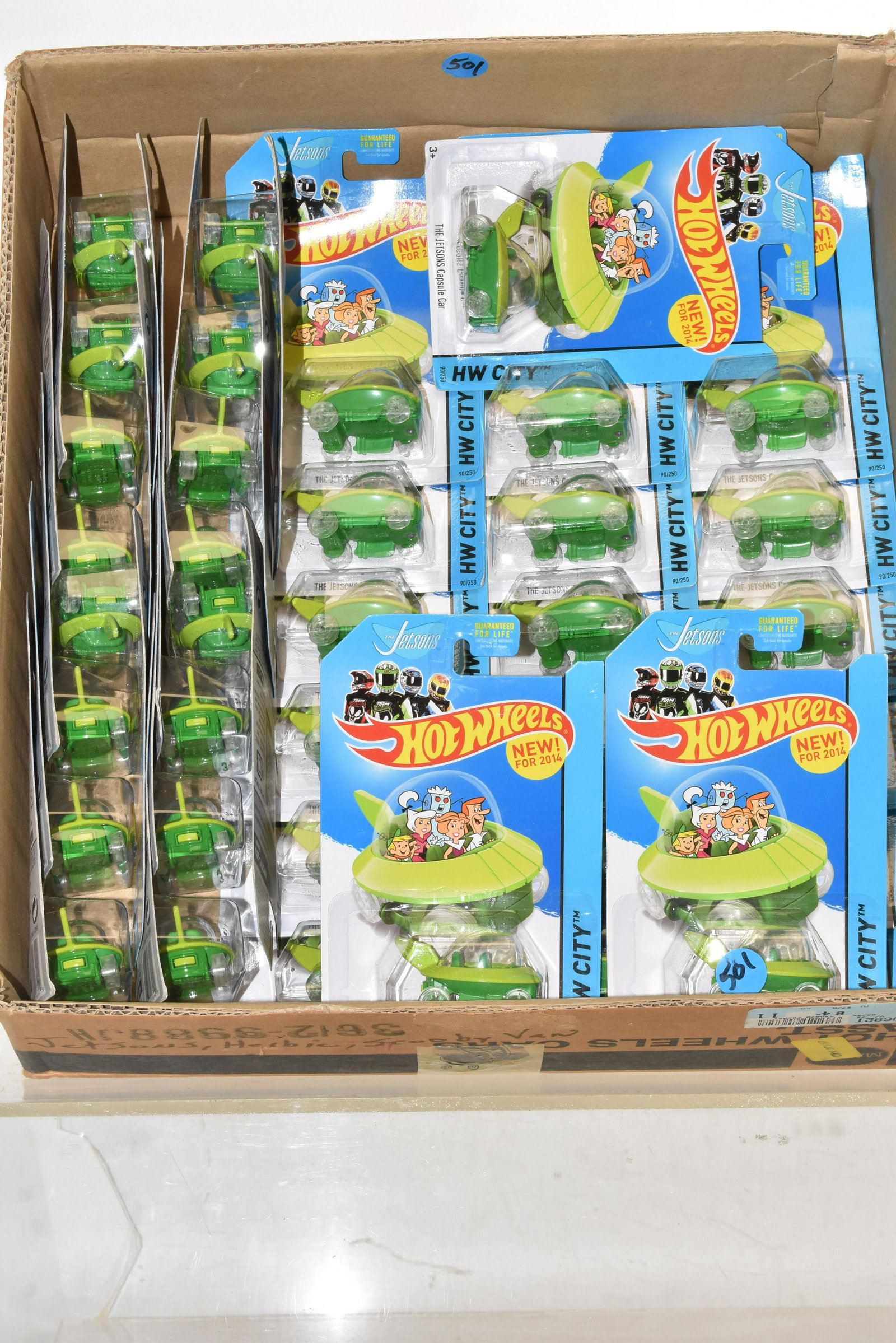 Grouping of Contemporary Jetson Hot Wheels: Thirty five Jetson capsule car hot wheels all on hang tags.