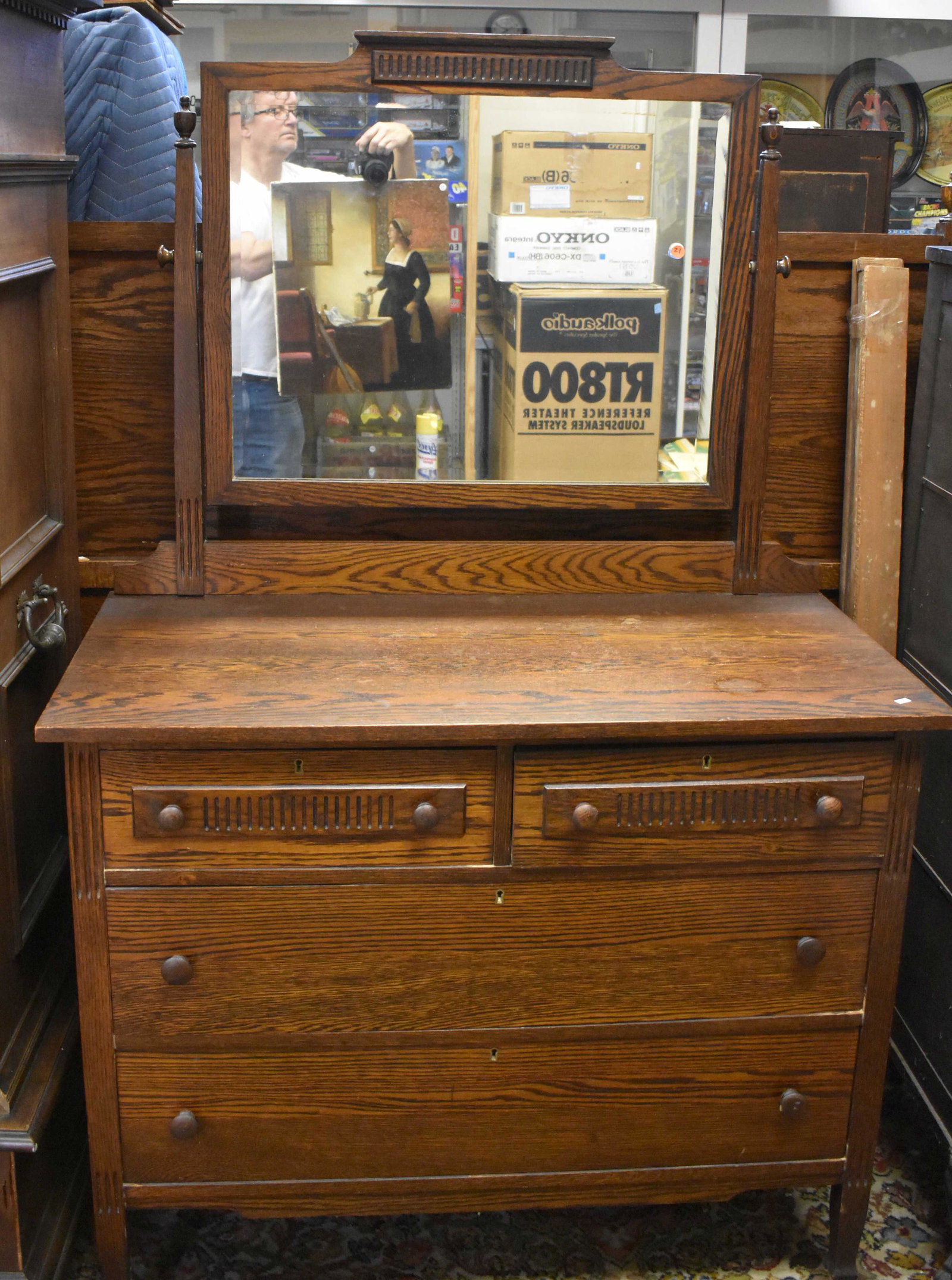 Vintage Oak Dresser and Bed: Dresser measures approx. 68" h to top of mirror. Mirror has beveled glass. Item is a two over two dresser and comes with a matching bed.