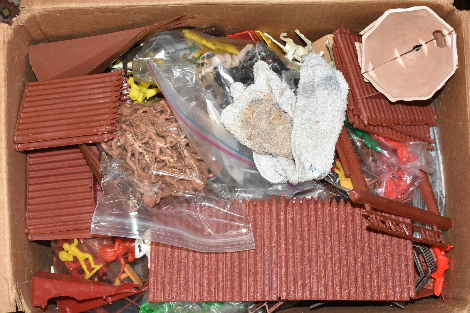 Collection of Cowboy and Indian Toys: Includes a disassembled Fort Apache, teepees and well over 100 plastic figures.