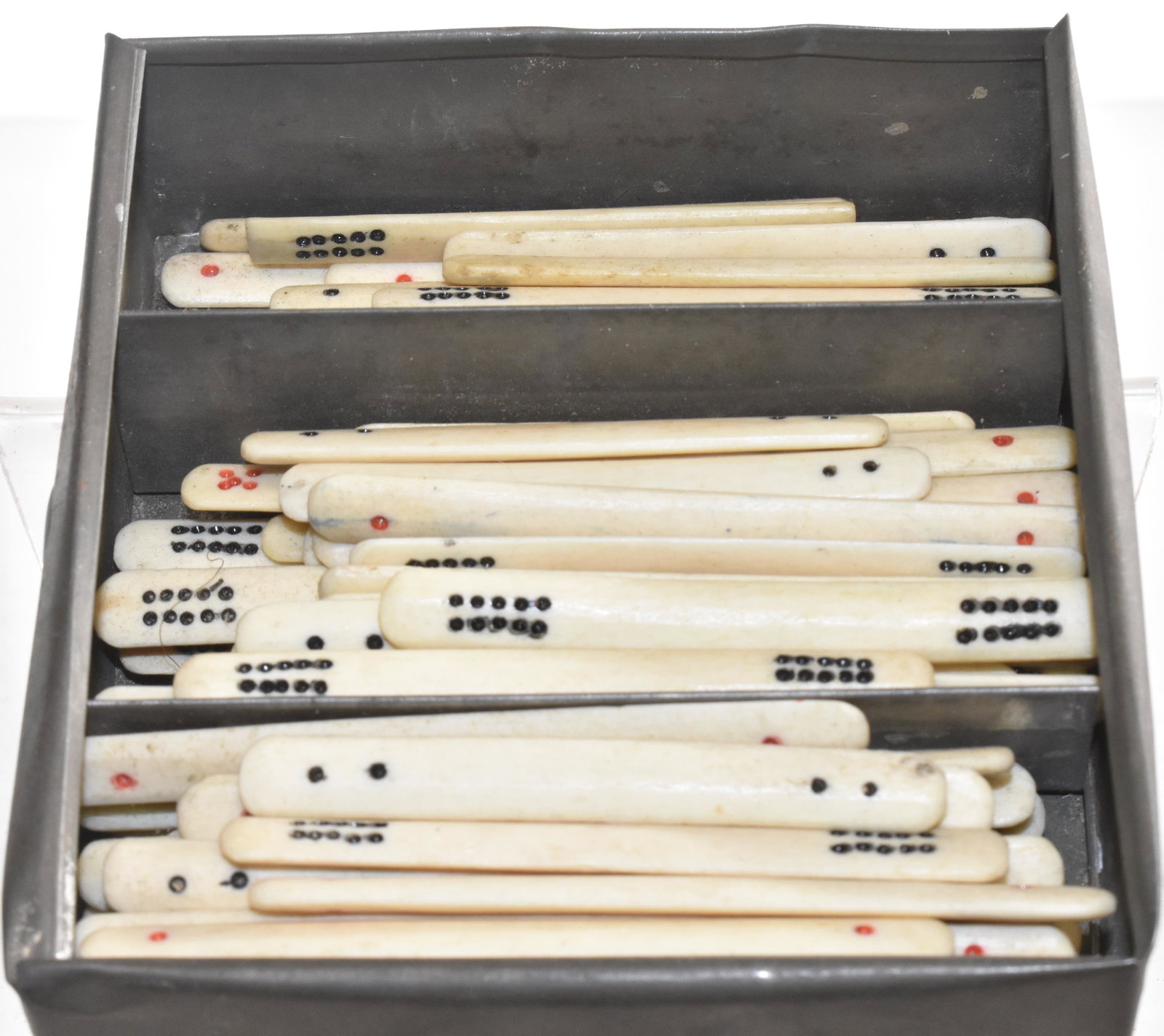 Bone Mah Jong Game Pieces: Each piece measures approx. 2 3/4" in length and come in original tin container with label.