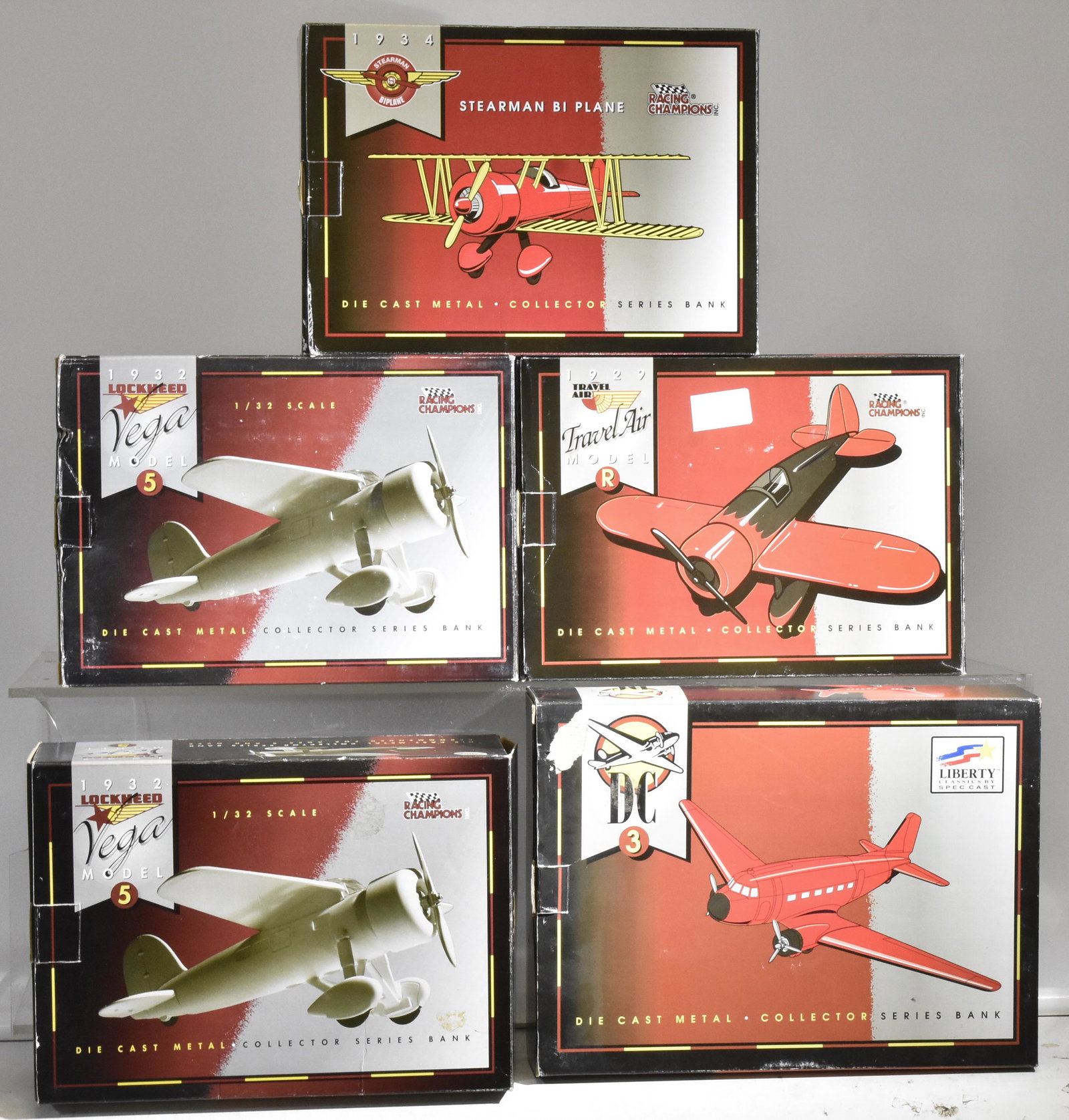 Racing Champions Die Cast Airplanes: Five die cast airplanes in original boxes.
