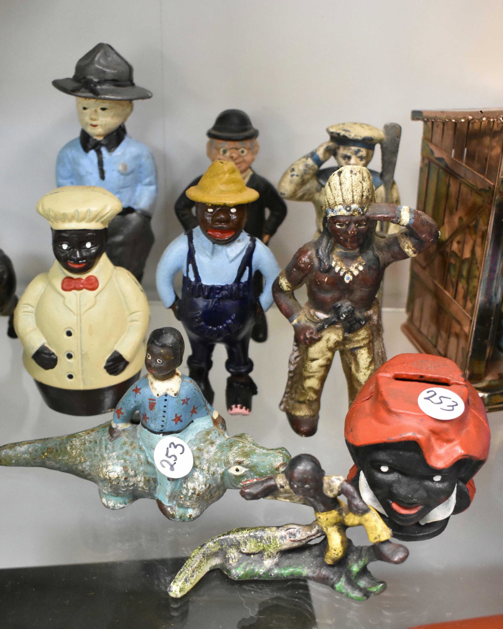 Contemporary Cast Figures and Banks: Nine figures including Black Americana and others.