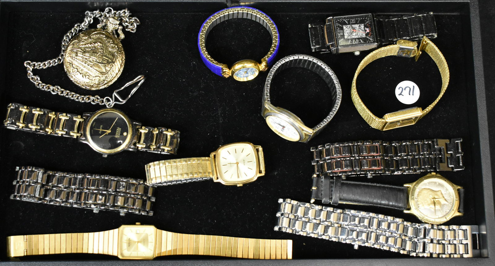 Grouping of Watches: Including a man's Acqua, a watch with a Kennedy half face, a Gruen quartz with day and Swiss movements, a Remington pocket watch with Swiss and Hong Kong parts in a railroad Union case and various oth