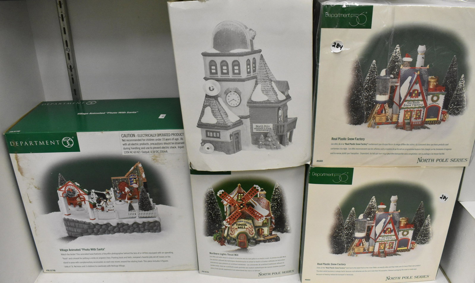 Dept 56 North Pole Series NIB: Photo with Santa Animated Village, two Teal Plastic Snowy Factories and others. Five total pieces.