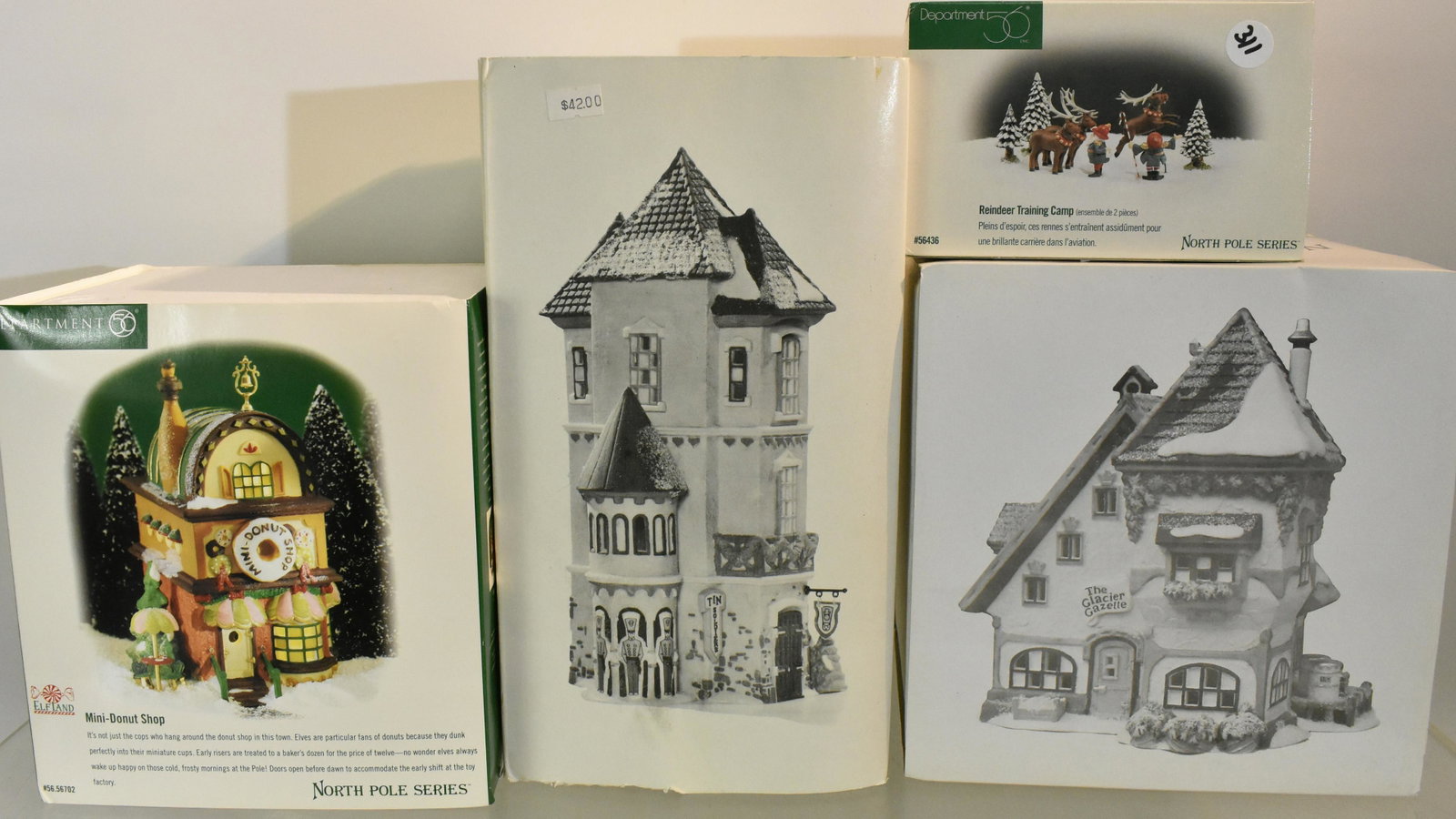 Dept 56 North Pole Series NIB (4): Tin Soldier Shop, The Glacier Gazette, Mini Donut Shop and Reindeer Training Camp.
