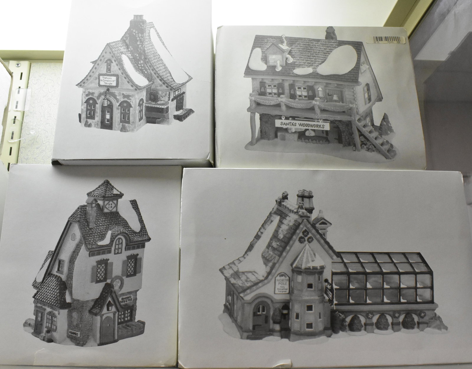 Dept 56 North Pole Series NIB: Santa's Woodworkers, Neenee's Dolls and Toys, Popcorn and Cranberry House and Mrs. Claus Greenhouse.