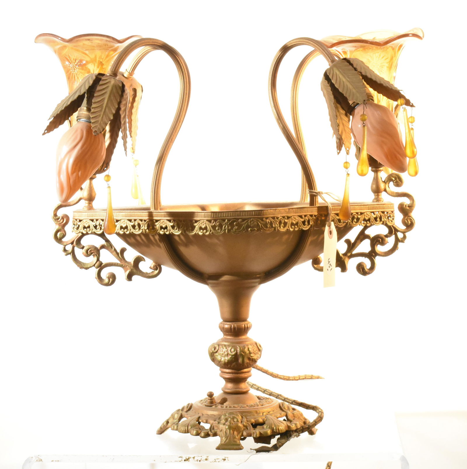 Early 20th C Epergne Table Lamp: Measures approx. 17 1'2"h. It has two epergnes and four stems with pink bulbs. Item retains most of its tear drop crystals. Plug needs to be replaced.