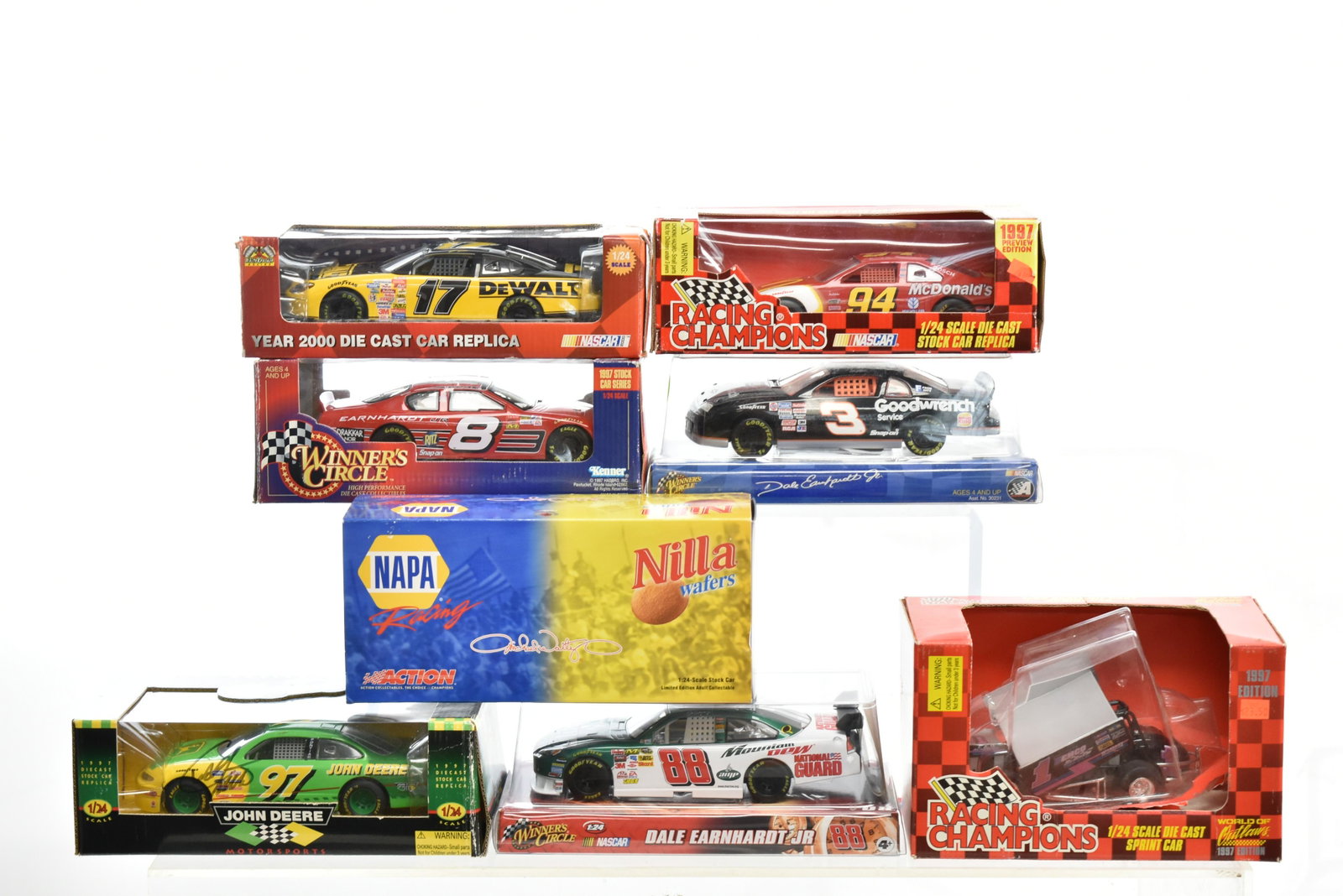 Eight Die Cast Nascars: Includes Dale Earnhardt, John Deere and others all in boxes