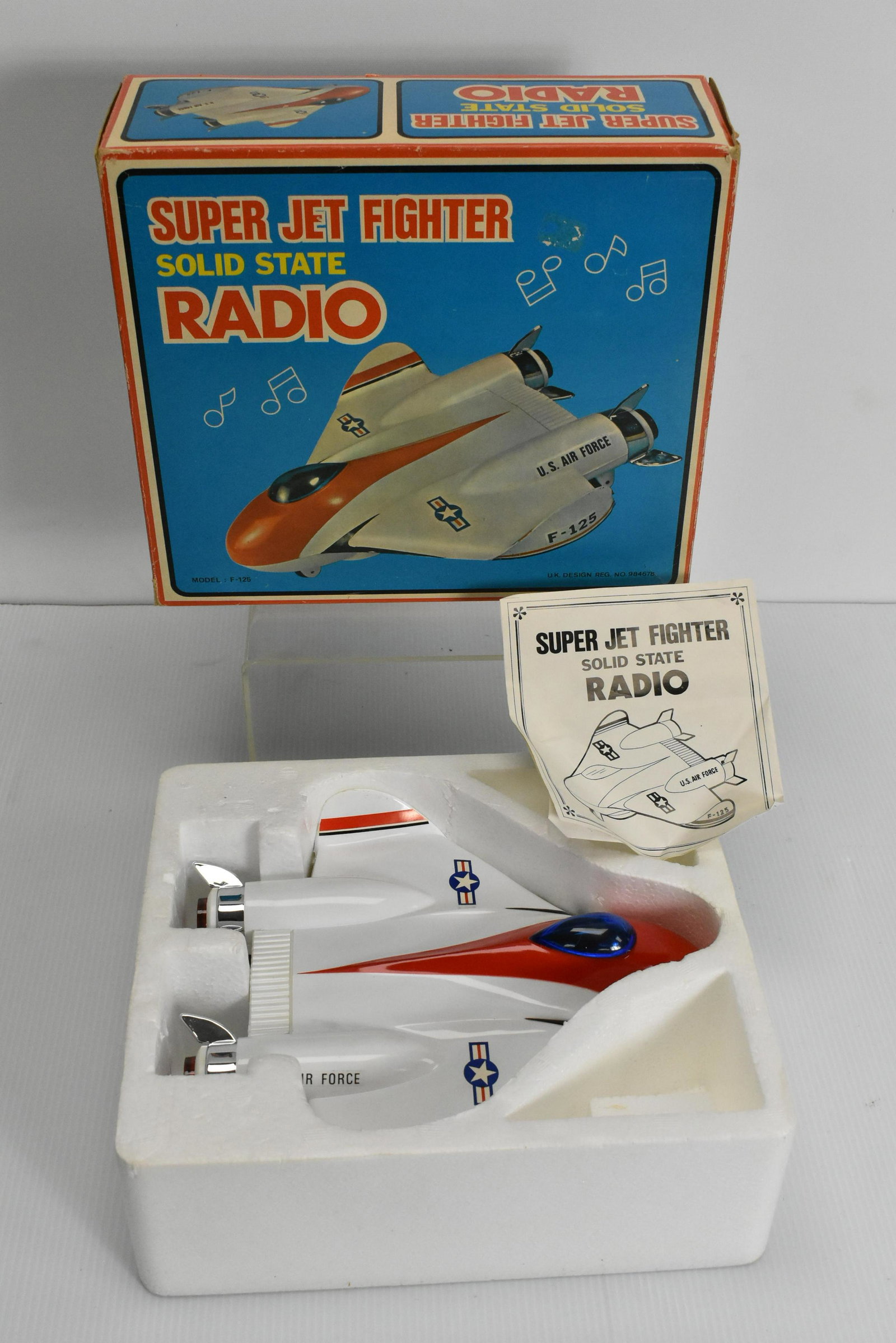 Super Jet Fighter Solid State Radio: Plastic made, circa 1960's to 1970's, Model F125, made in Hong Kong UK design, box in good condition, appears to be unused