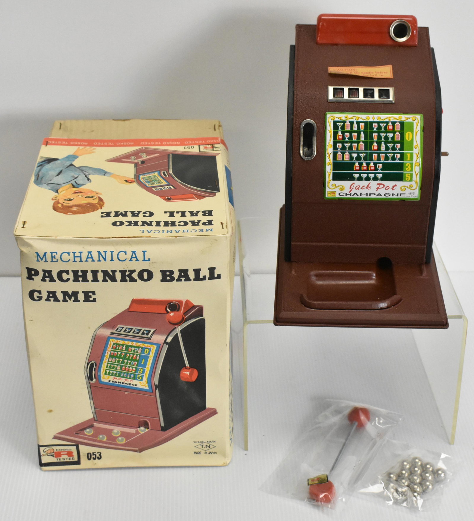 T.N Japanese Mechanical Pachinko Game: #053, 7.75" high, original box (good condition), great shape, metal construction, circa 1950's