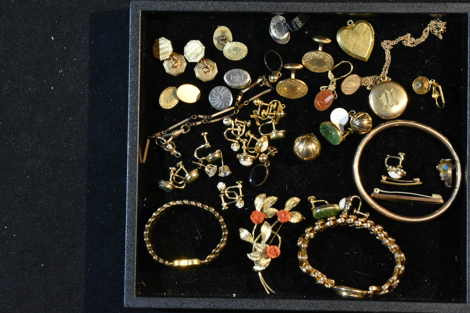 Gold Filled Jewelry Grouping: Gold filled baseball and basketball pendants, three bracelets, lockets, earrings and cuff links.