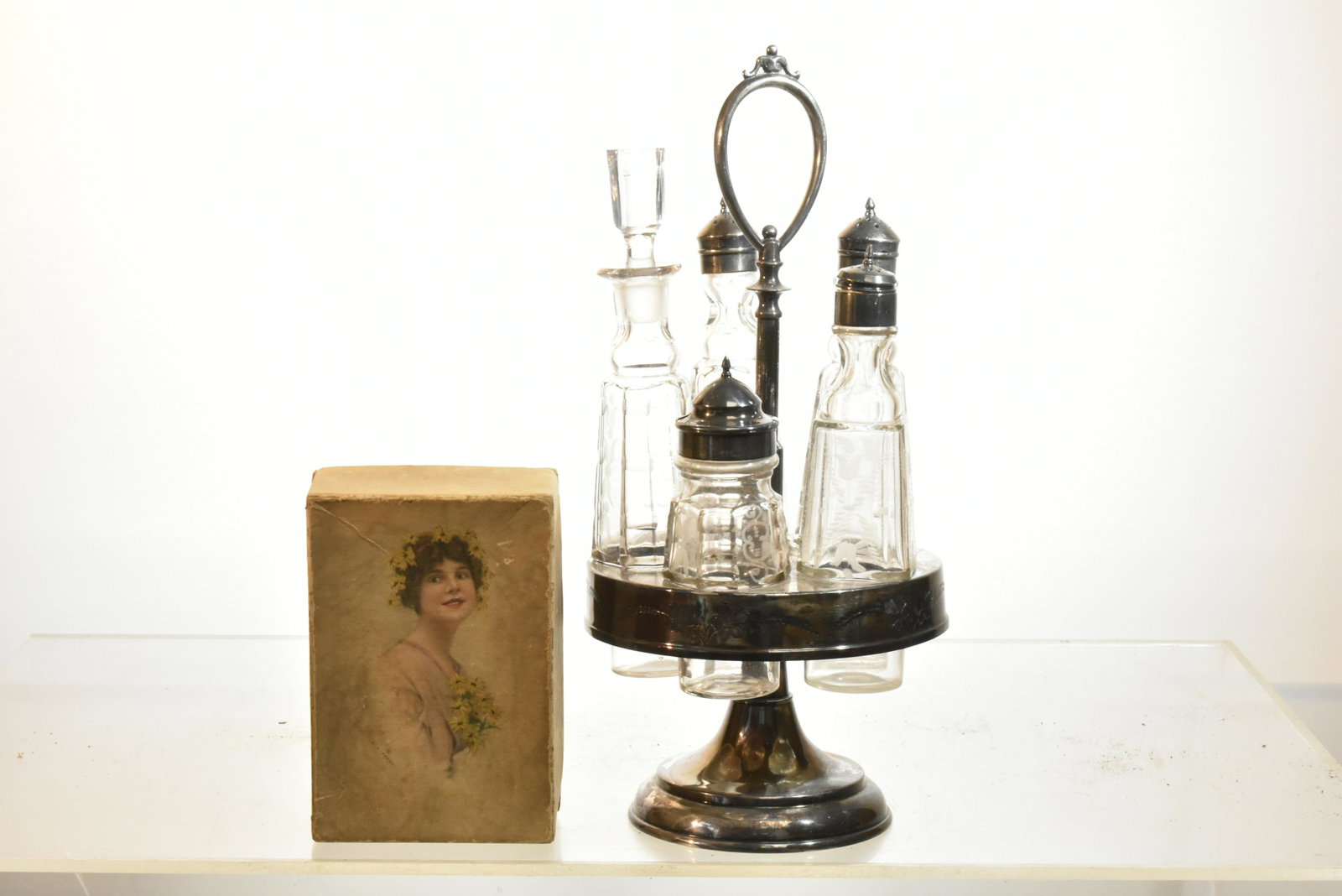 Victorian Silver Plate Condiment Set & Candy Box: Condiment set measures approx. 13 1/2"h. It is a five piece set and is complete. Lot also includes a decorative candy box Sheets Candy Lancaster, Pa.