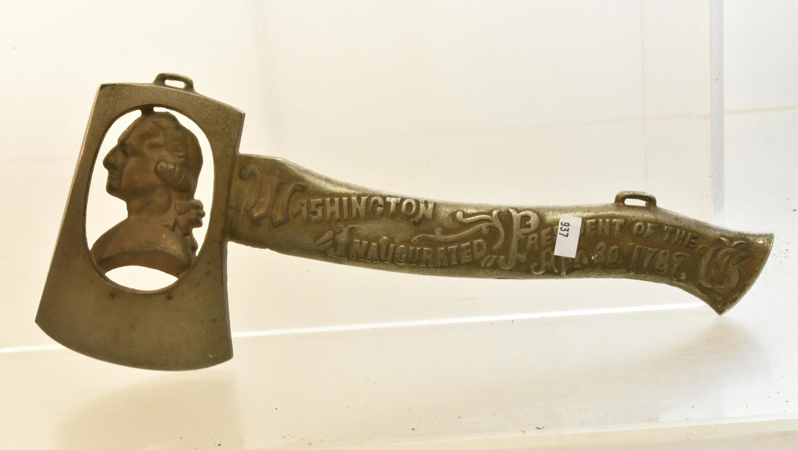 George Washington Presidential Hatchet: Measures approx. 12 1/2" in length. It is nickel plated and dates to the early 20th century.