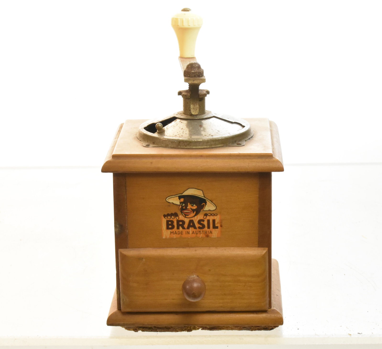 Vintage Austrian Coffee Grinder: Measures approx. 7"h. It is a "Brazil" brand. label is in good condition, is functional , label is in good condition and item comes with paperwork.