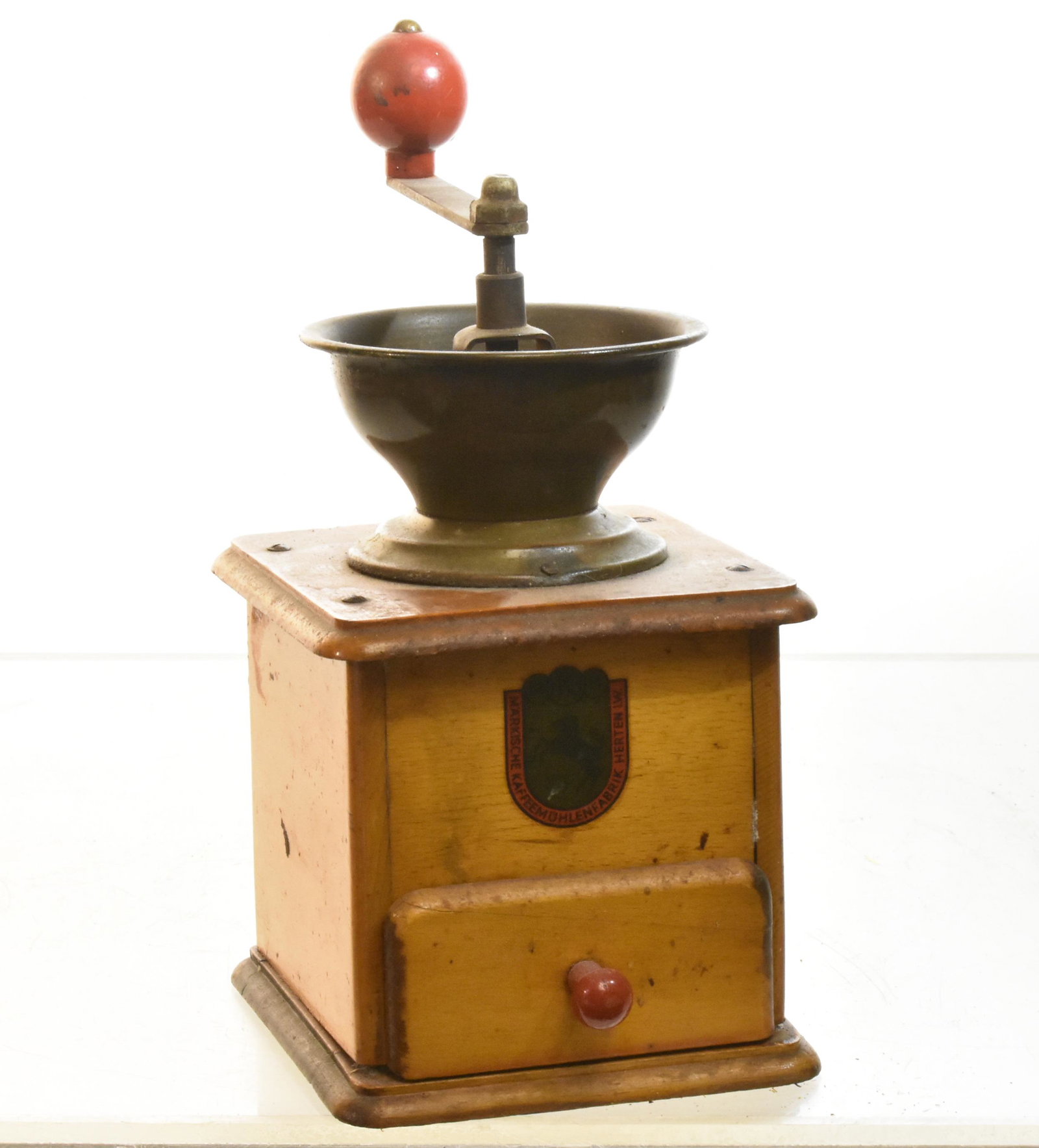 Vintage MKH Coffee Grinder: Measures approx. 8 1/2"h. It has a good graphic label and is functional.