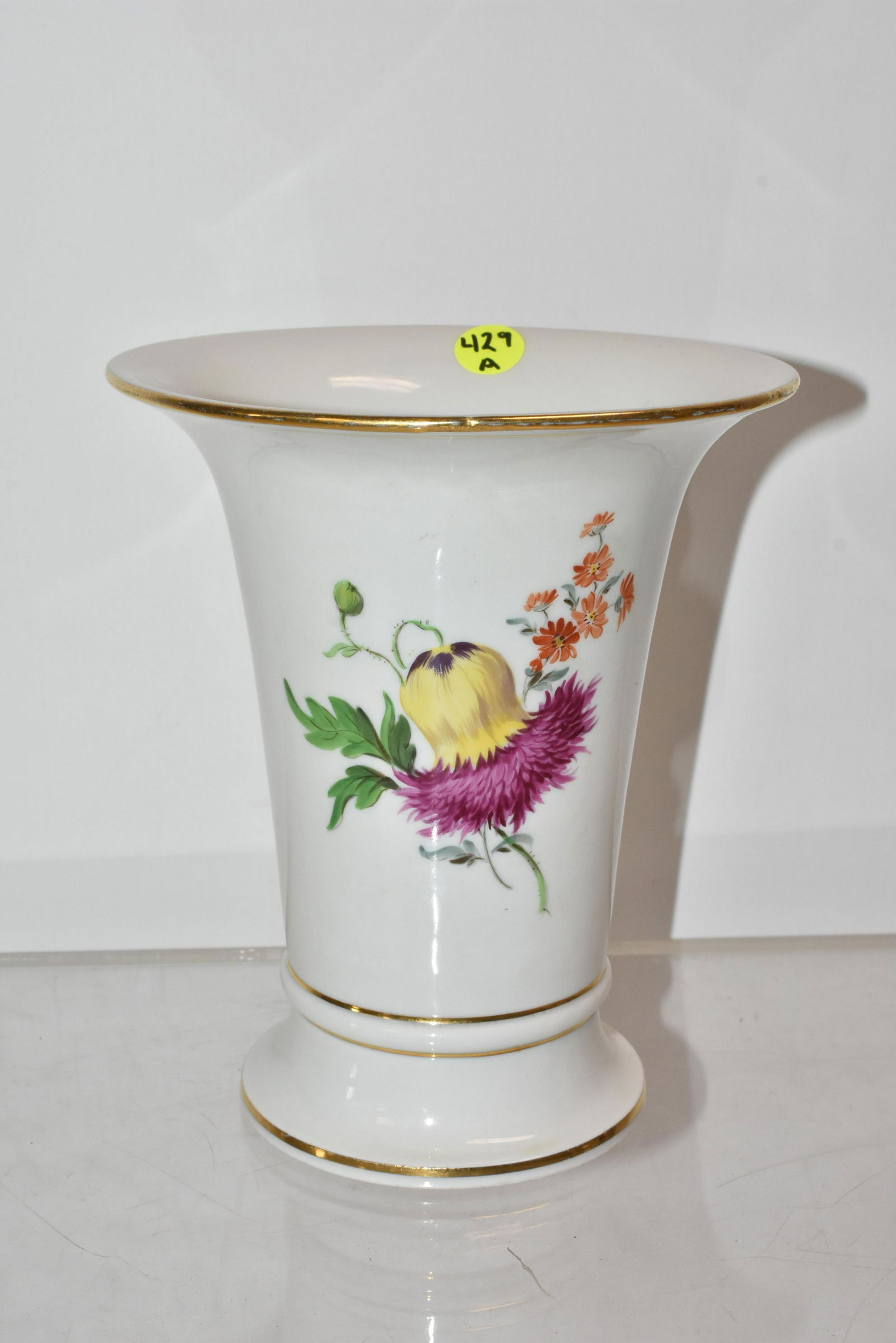 Large Meissen Floral Vase: Vase measures approx. 7 1/2" high. it has a hand painted floral body, good gold flashing and no visible flaws. vase has Meissen cross sword mark on bottom.