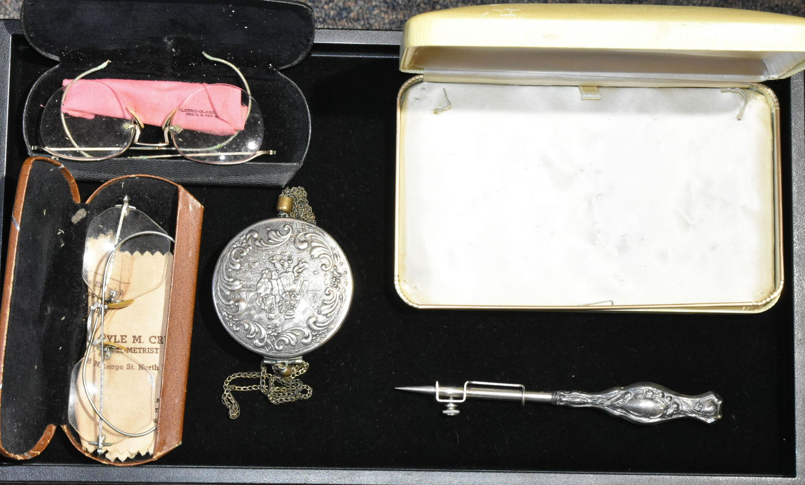 Victorian Sterling Scribe, Eyeglasses and more: Including a scribe with a sterling handle, two pair of vintage eyeglasses and a vintage compact with a Dutch motif.
