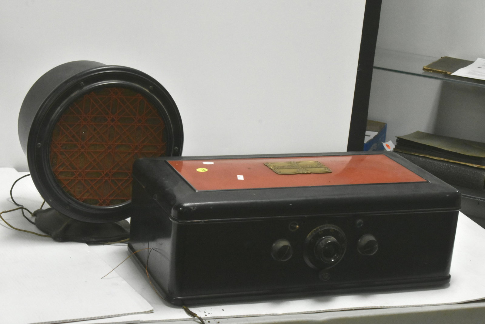 Vintage Atwater Kent Metal Radio and Speaker: Radio measures approx. 7" high x 21" x 10 1/2". Radio has factory red and black painted body with brass tag. Speaker is a Type F-4 with serial # 2116013. Condition is superior. Auction company does no