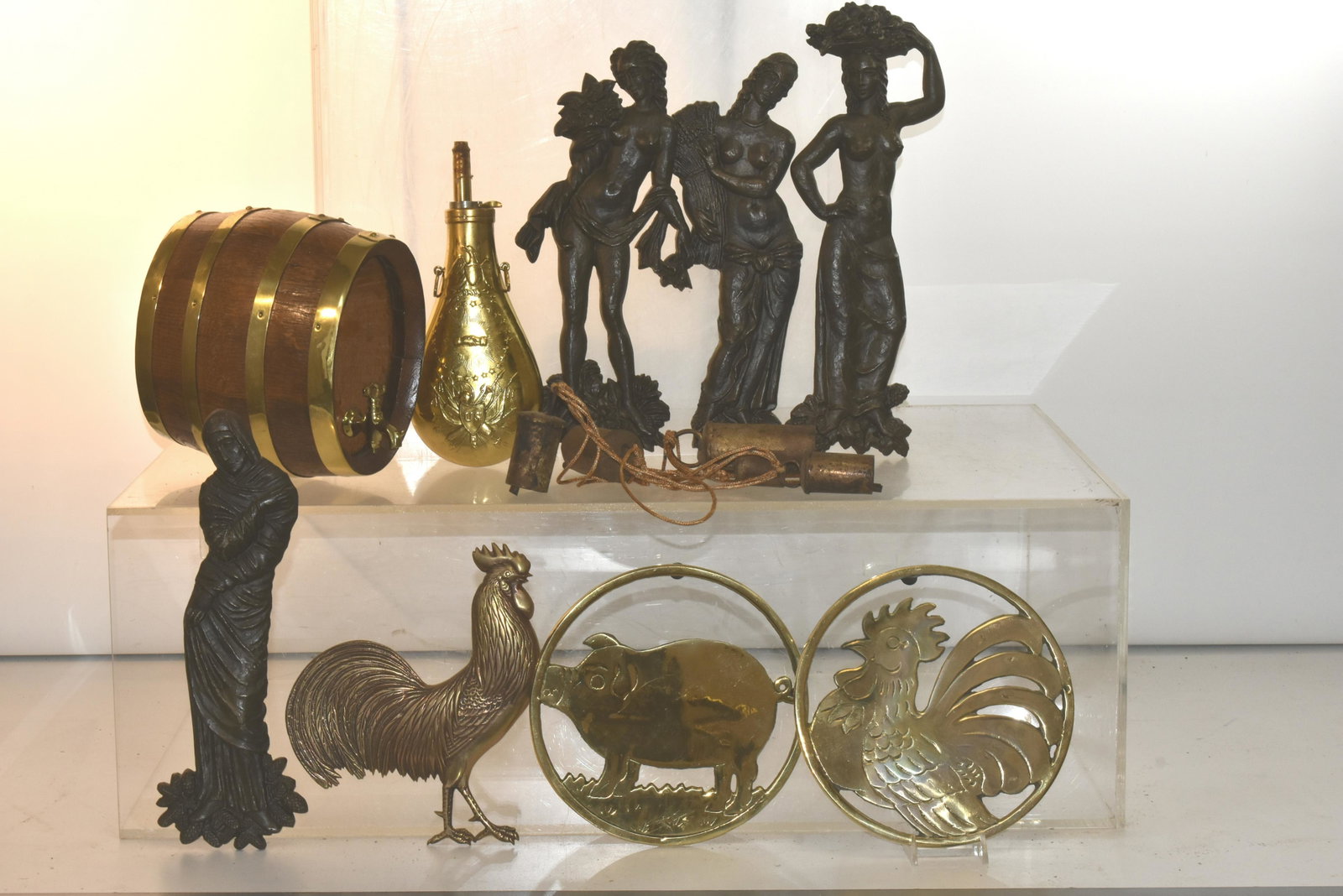 Mixed Metal Ware Grouping: Lot includes (4) Italian style wall hangings, (3) brass chickens (2 are trivets), a contemporary powder horn, and a Seth Leithge oak barrel with brass straps.