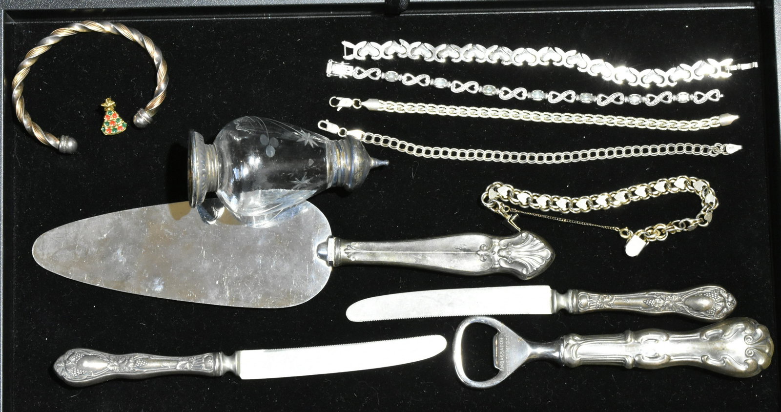Sterling Jewelry and Flatware: Lot includes (4) Sterling bracelets, a sterling & 14K Cuff, and various Sterling handled flatware.