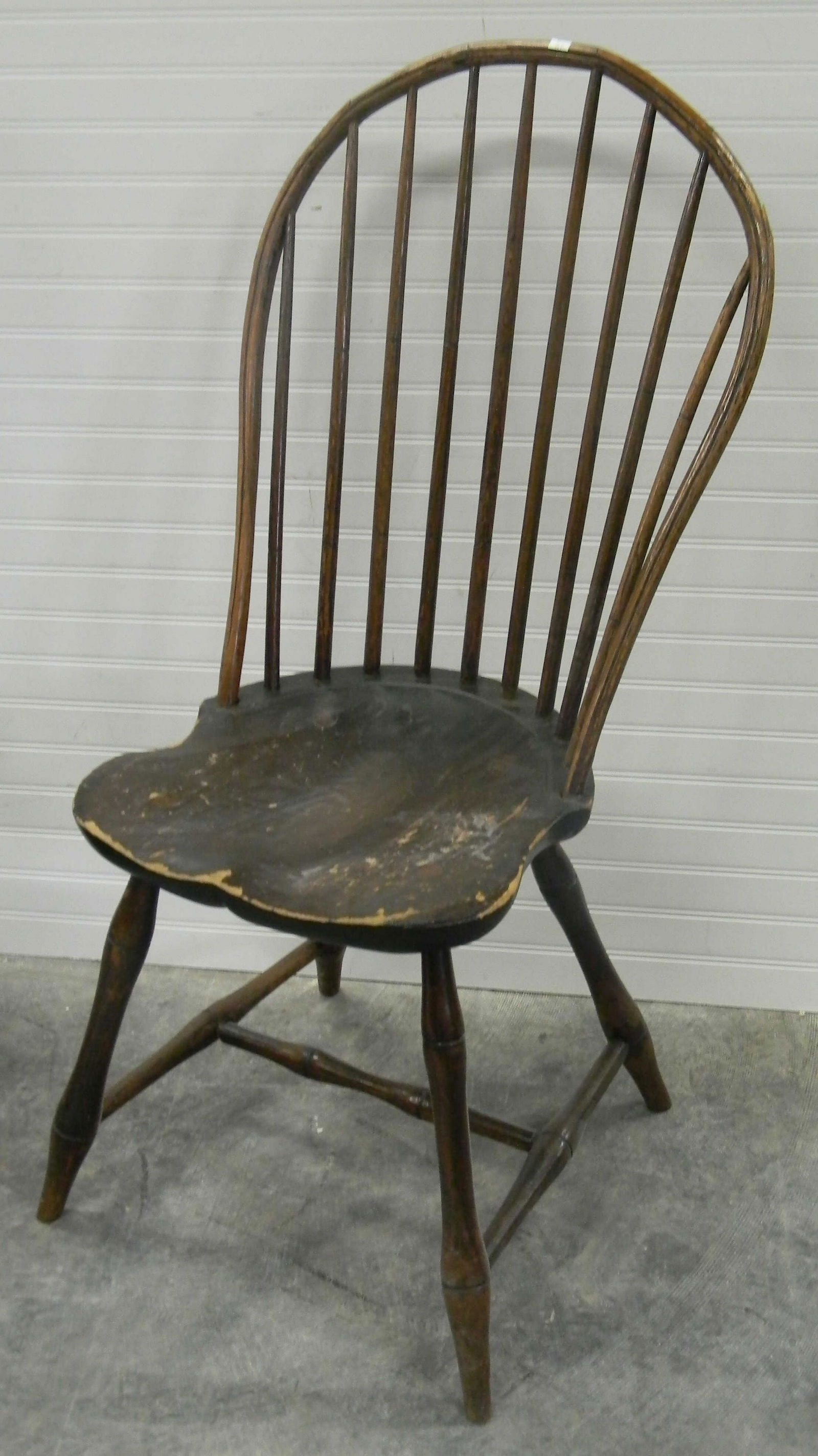 Period Hoop Back Windsor Chair: Item has (9) spindles, some cracks in hoop, a seat with gutter, and an H stretcher base.