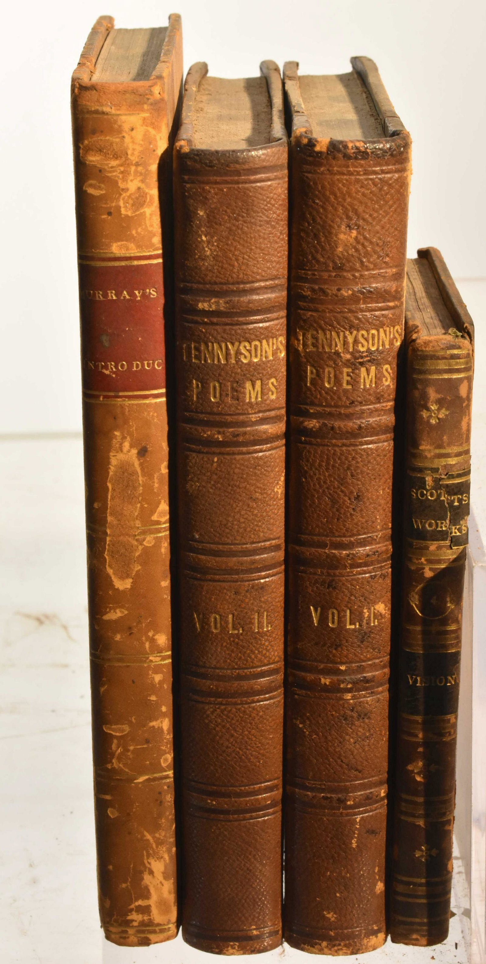 (4) Early Leather Bound Poetry Books: Lot includes Complete 2 Vols. of Poems by Alfred Tennyson 1846 (2nd vol. inscribed inside, "R. Phillips Tom Carolina Phila 1846"), The Vision of Don Roderick a Poem by Walter Scott, 1811, published by