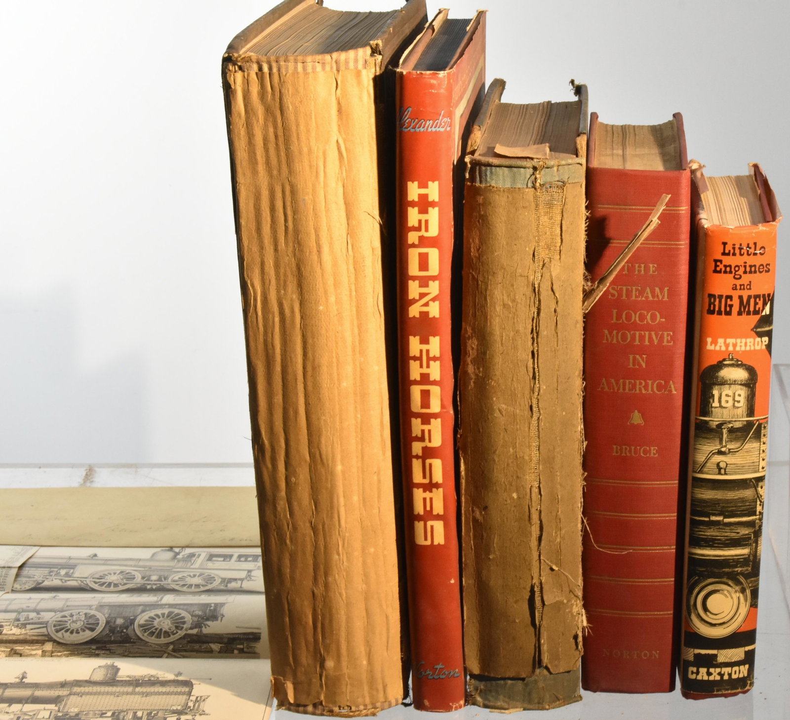 (5) Railroad Related Antique and Vintage Books: Lot includes The Steam Locomotive in America, by Alfred W. Bruce, with inscription from Meade ancestor, 1952, Little Engines and Big Men by Gilbert Latherop, 1955; The American Railway (detached back 