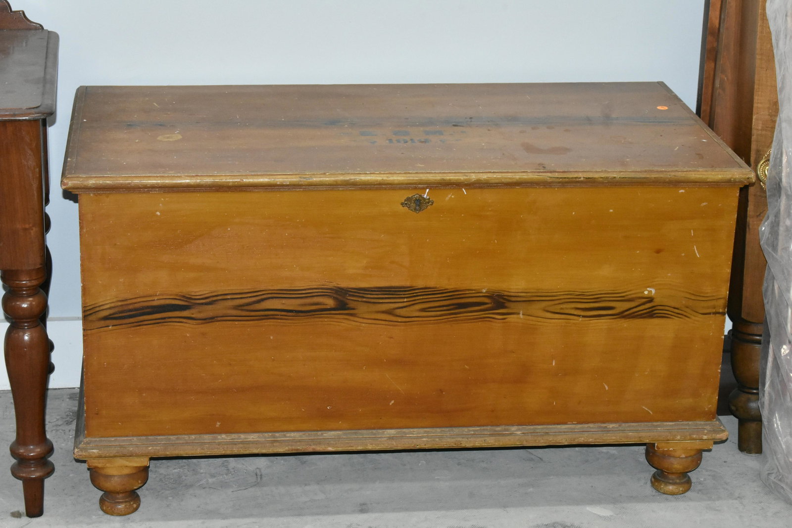 PA Dovetail Blanket Chest Dated 1914: Item measures approximately 24"H x 43"W x 22"D. It has original paint decorated surface, it is initialed and dated 1914.