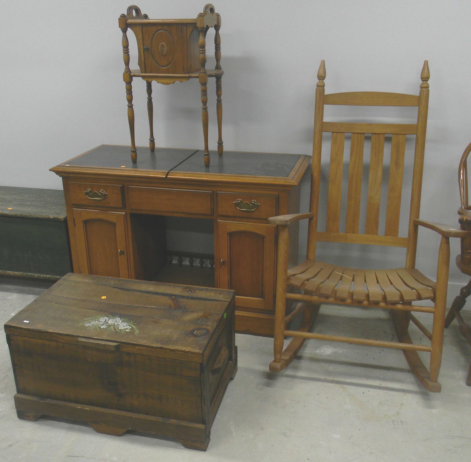 Mixed Furniture Grouping: Lot includes a maple desk, a smoking stand, a wooden toy box, and a slat back rocking chair.