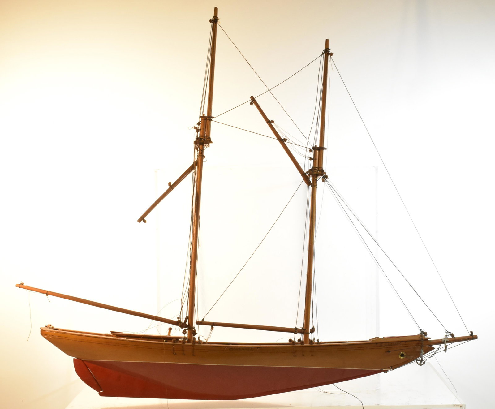 Wooden Pond Boat: Item measures approximately 28"H x 32"L. It has a working rudder; it is missing sails but otherwise appears to be complete.