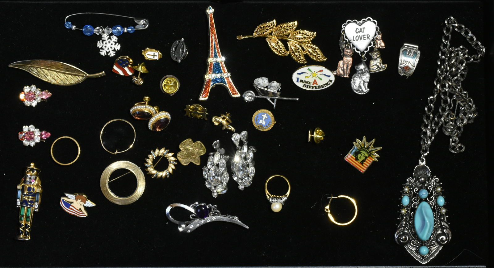 Vintage Estate Jewelry: Lot includes a pair of Weiss rhinestone earrings, a small Ciner pin, amethyst and sea pearl gold-filled screw back earrings, enameled Eiffel tower pin and more.