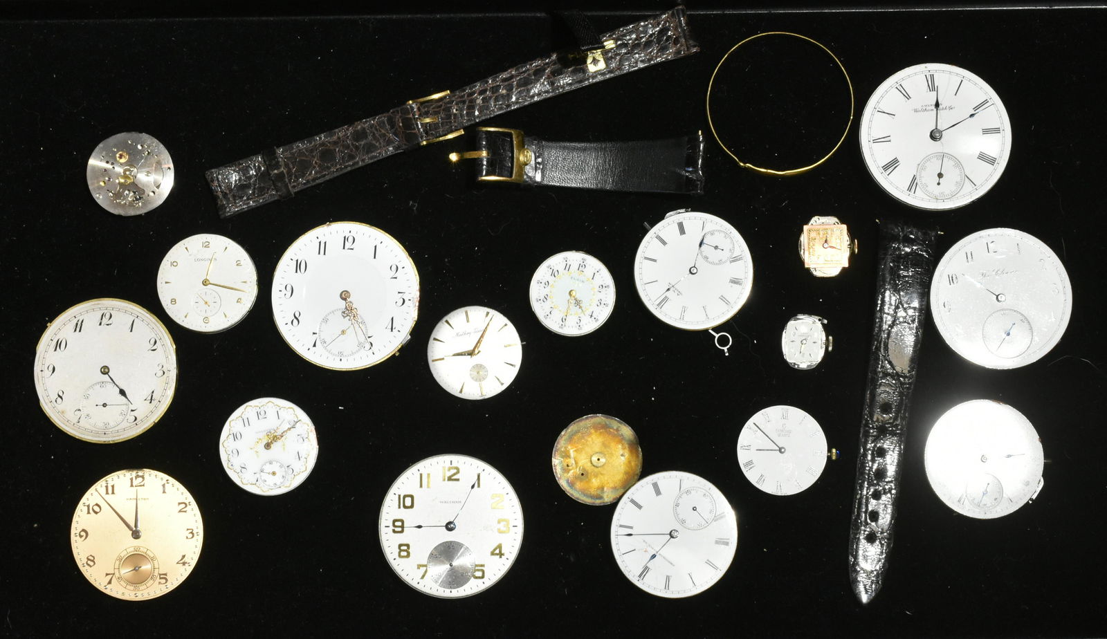 19th and 20th C Watch Movements: Lot includes pocket watch movements by Hamilton, Elgin, Waltham, and others. Lot also includes wrist watch movements by Longines, Mathey, Tissot, and others.