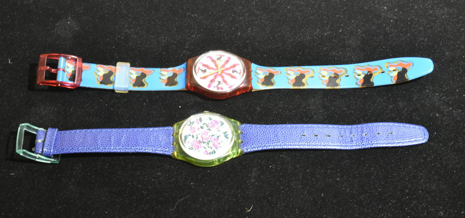 (2) Swatch Watches: Lot includes 1991 rooster watch, watch with floral face and blue leather band.