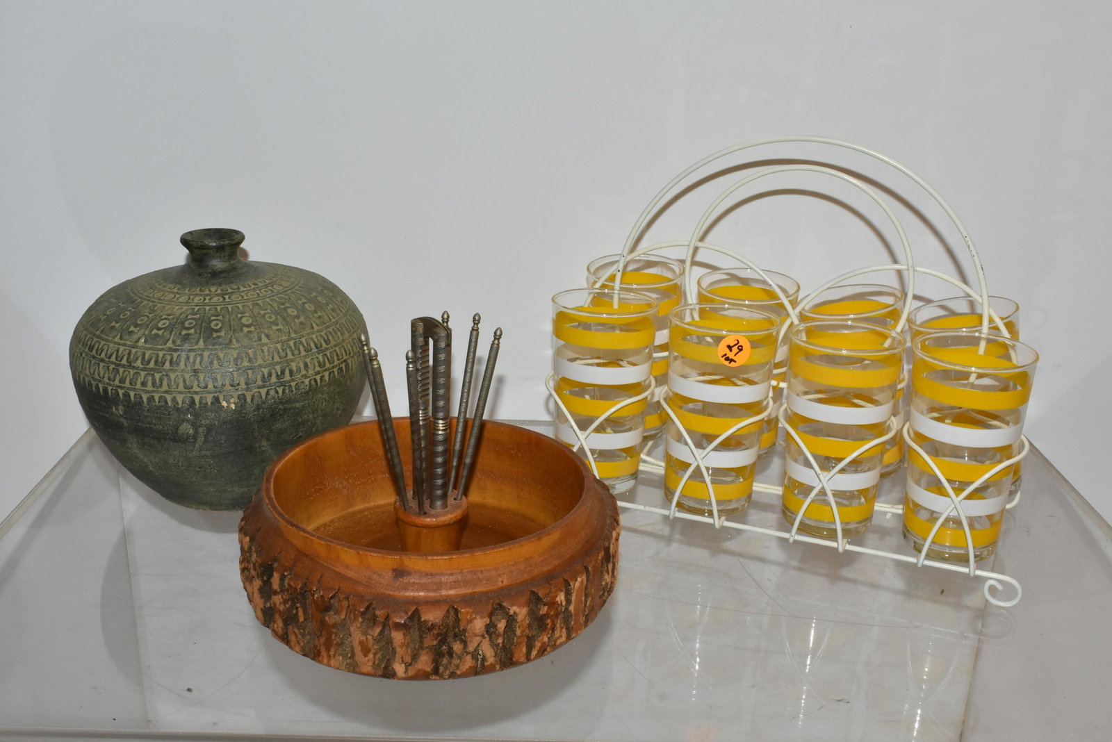 Vintage Kitchenware Grouping: Lot includes a striped tumbler set in carrier, a nut set, and a green vase.