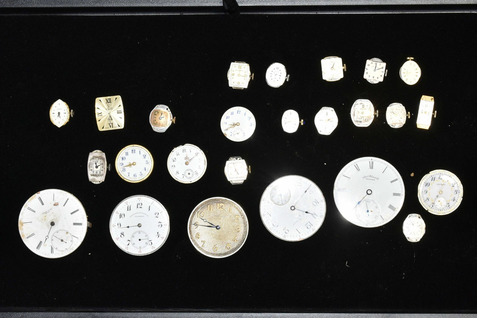 Antique Watch Movements: Lot includes a Waltham pocket watch movements, several Hamilton, Bulova, and more.