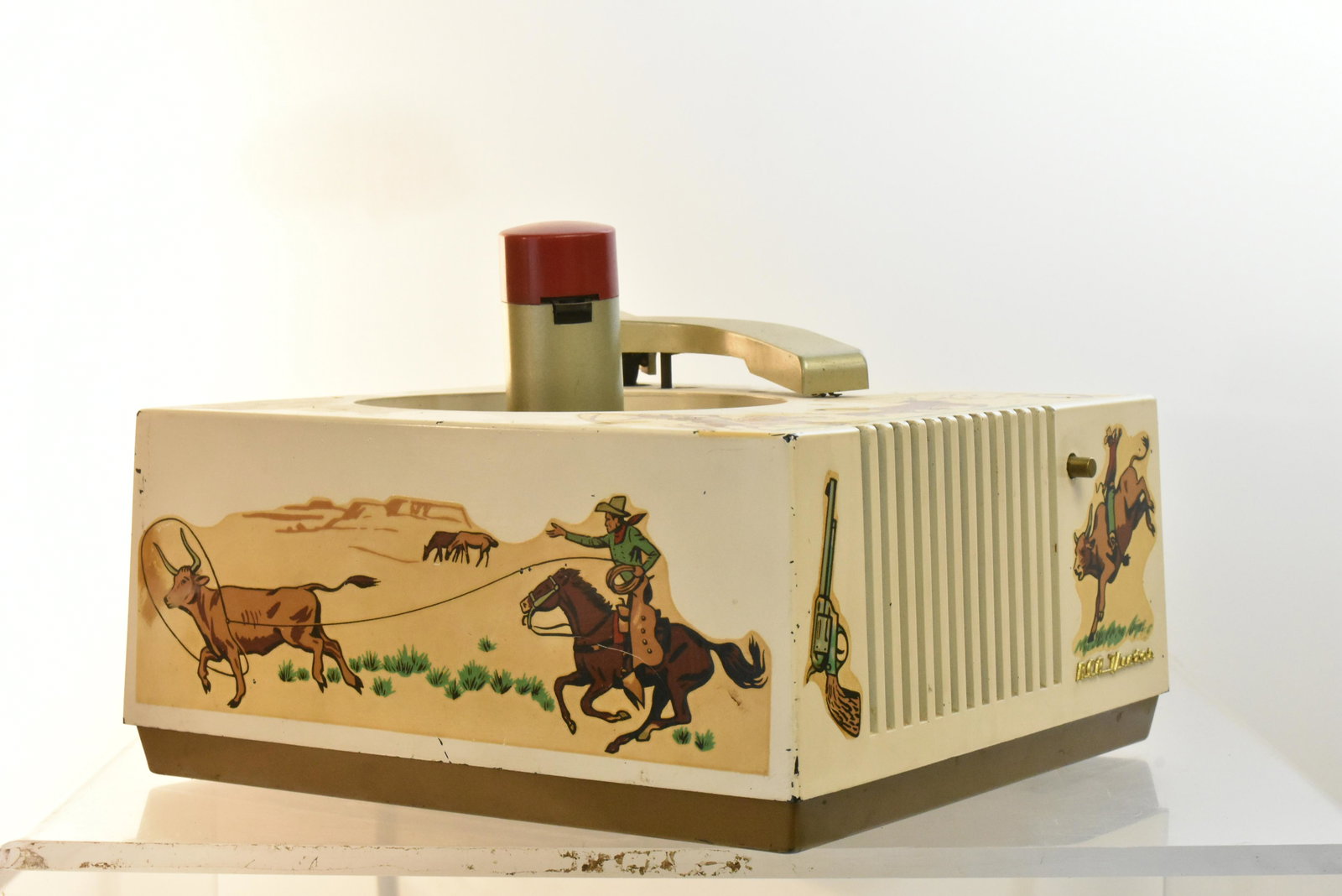 RCA Roy Rogers Record Player: Item is a RCA Victor record player with Roy Rogers graphics. It is a tube model, and the interior is loose.