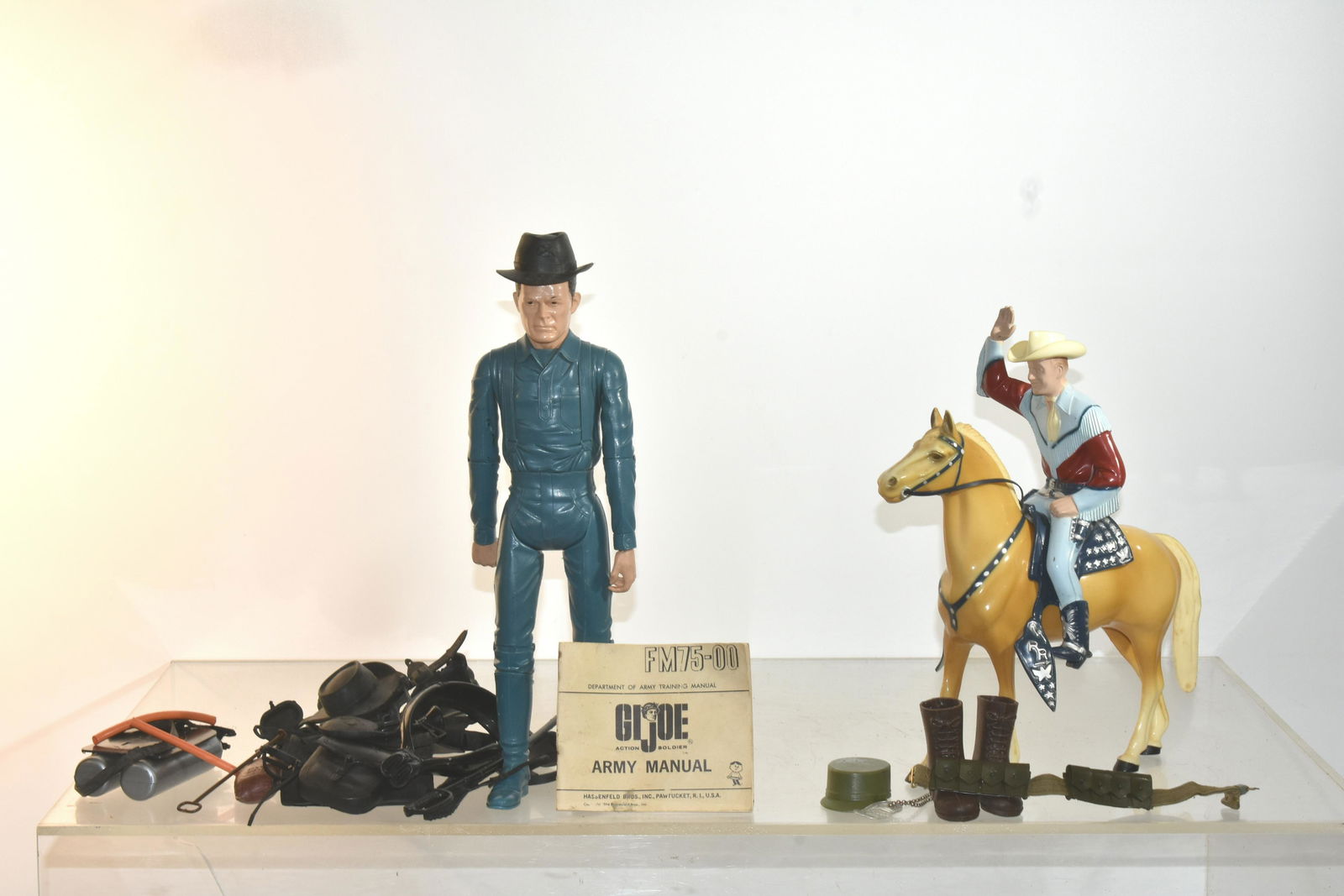 Roy Rogers and Johnny West Figures: Lot includes Roy Rogers and Trigger, a Johnny West figure, and various accessories (some are G.I. Joe).
