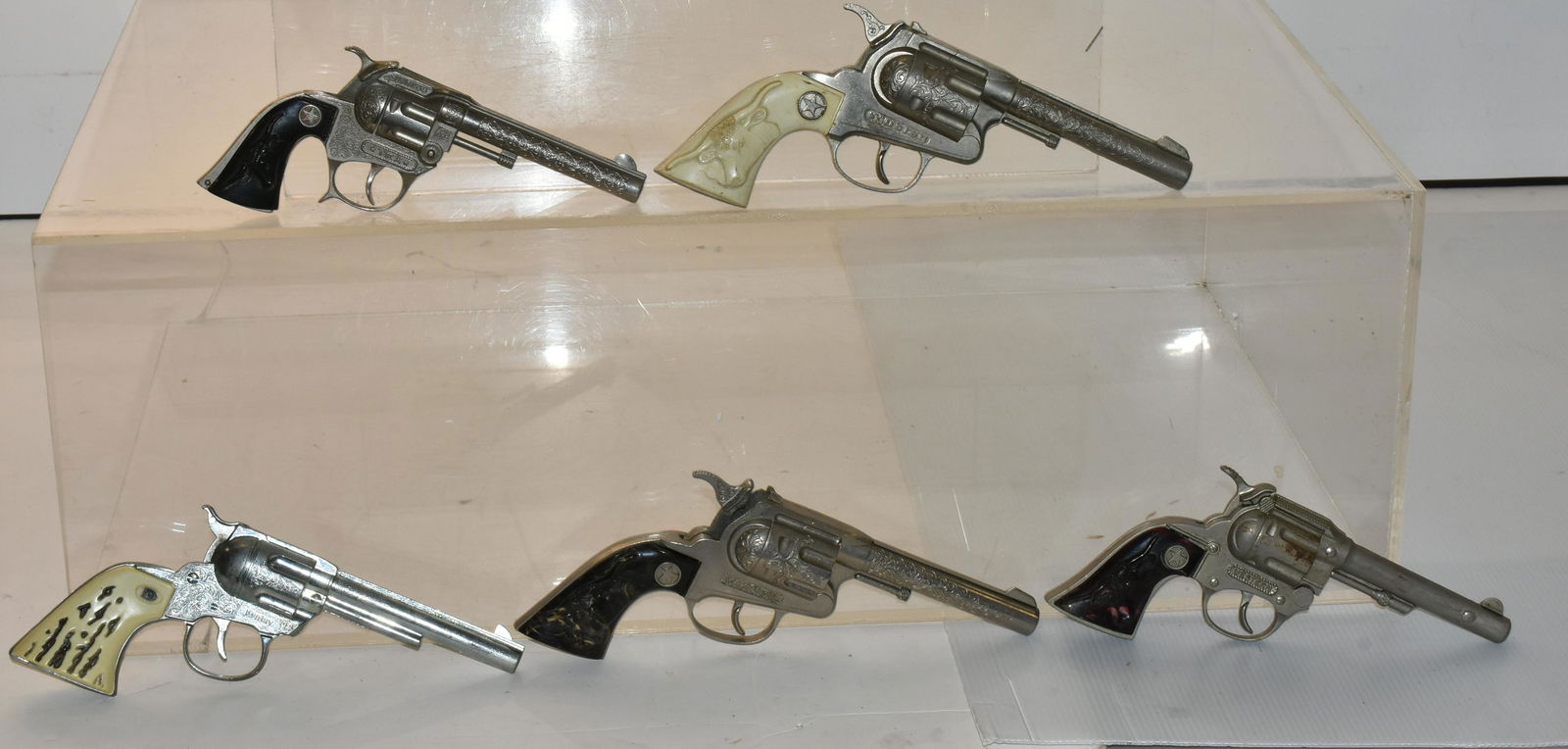 Vintage Cap Pistols: Lot includes Daisy, Tex, Marshall, and (2) Hobley (both with sticky triggers).