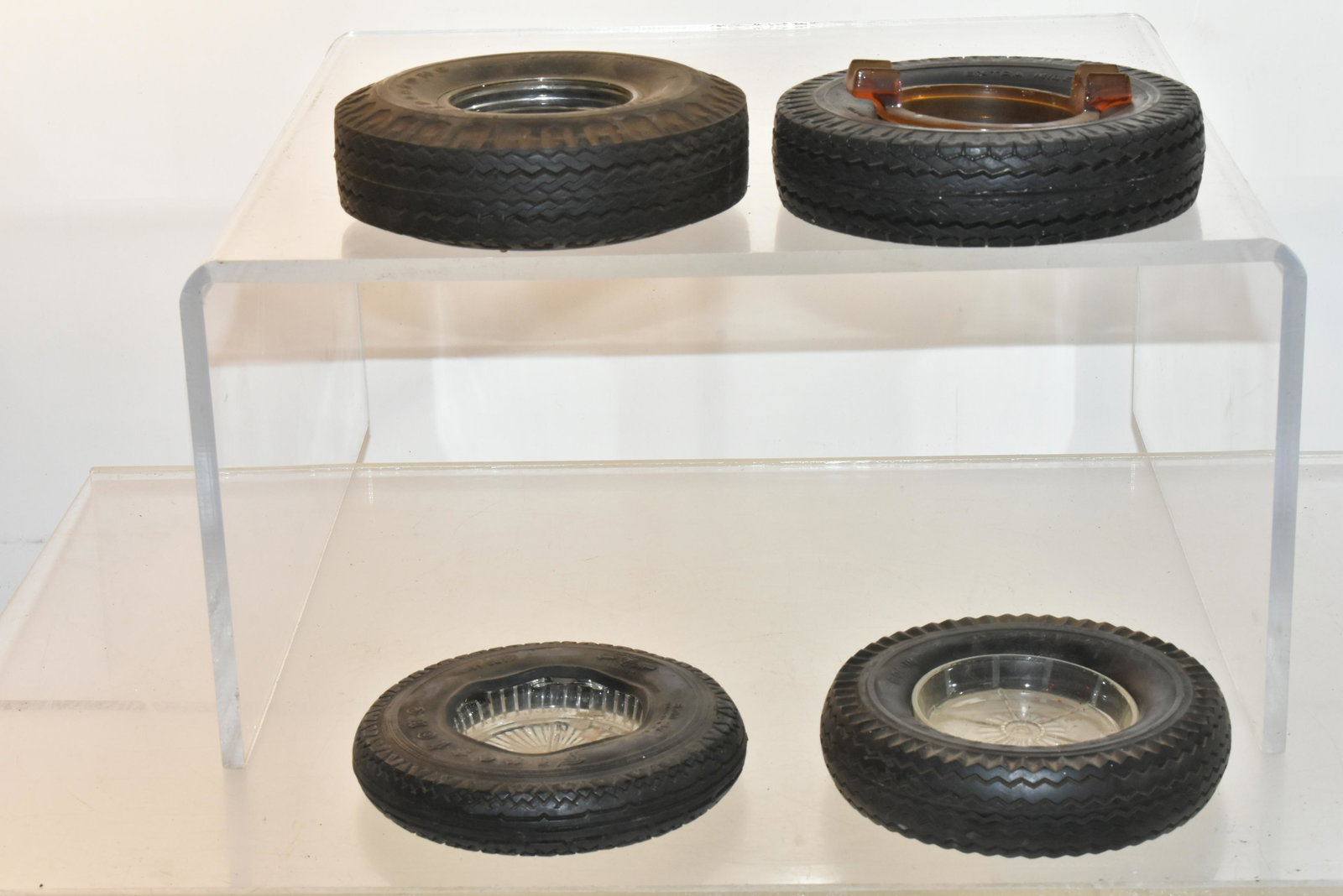 (4) Vintage Firestone Tire Ashtrays: Lot includes (4) Firestone ashtrays, and (2) are truck tires.